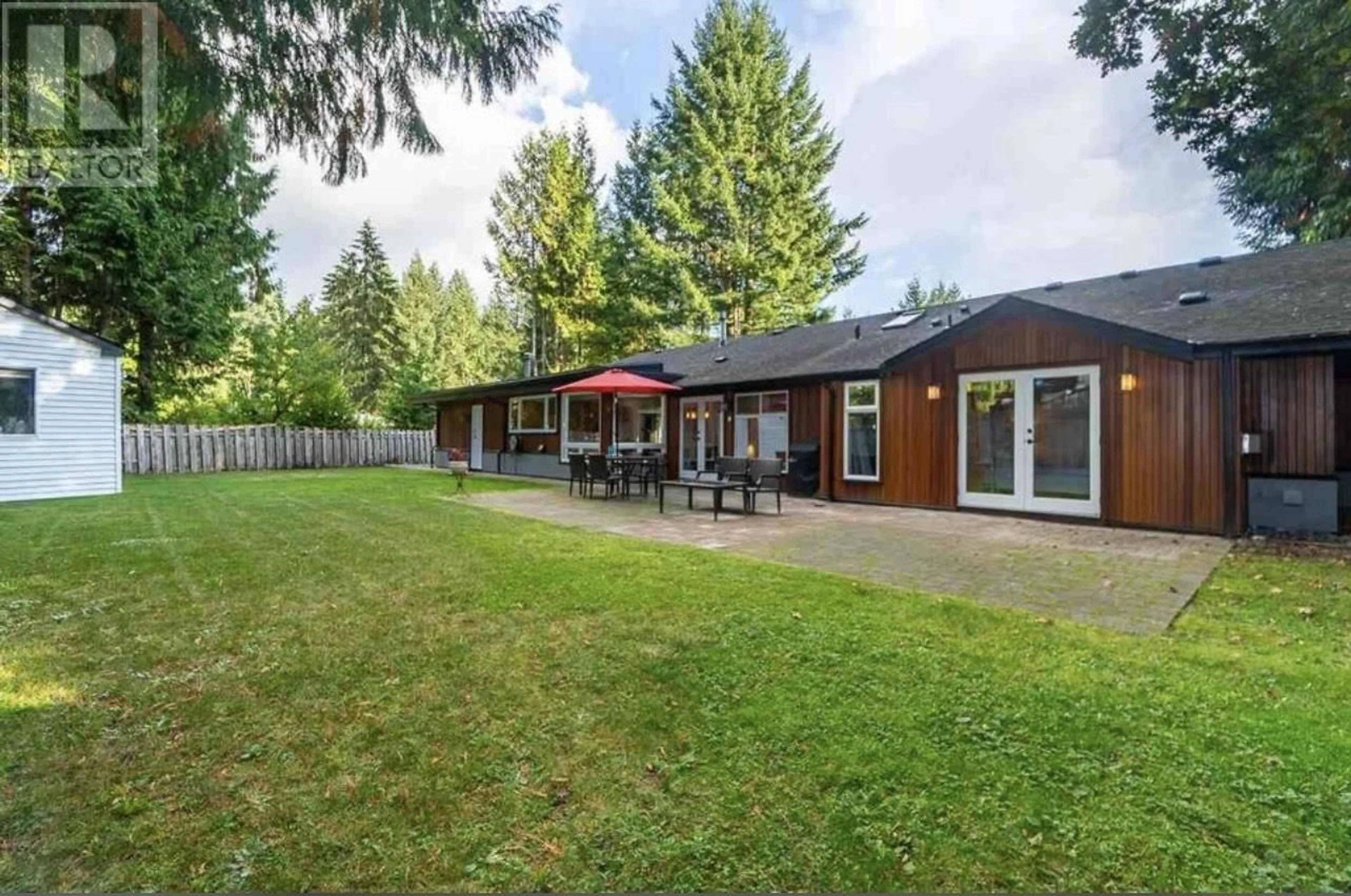 Frontside or backside of a home, the fenced backyard for 81 MORVEN DRIVE, West Vancouver British Columbia V7S1B3