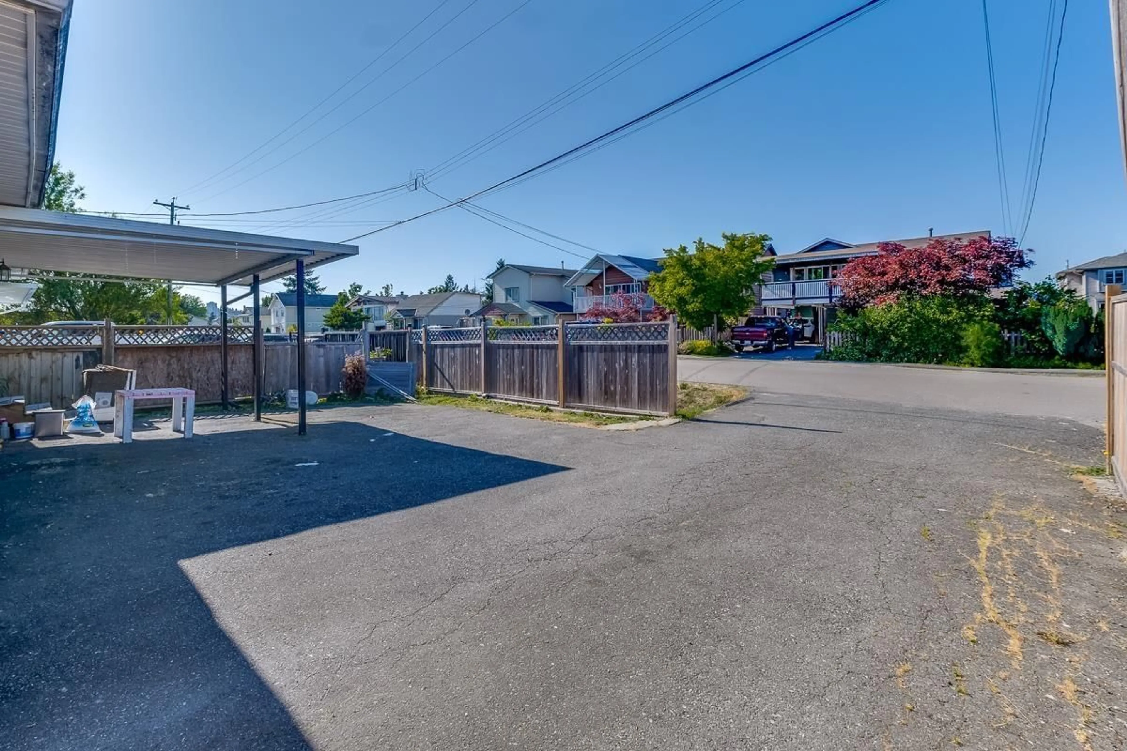 Frontside or backside of a home, the fenced backyard for 12778 114 AVENUE, Surrey British Columbia V3V3P1