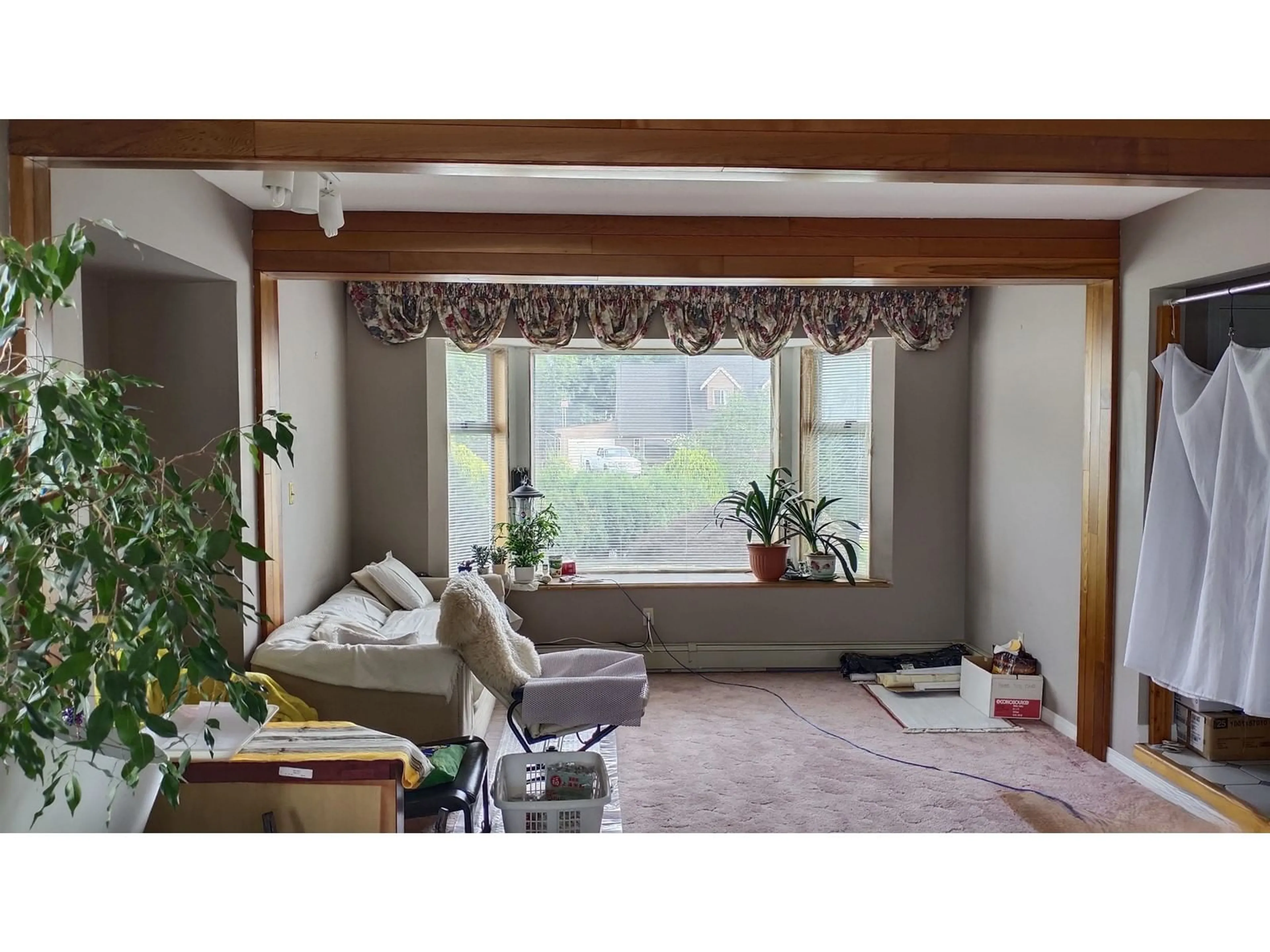 Living room with furniture, wood/laminate floor for 12978 96A, Surrey British Columbia V3T5K5