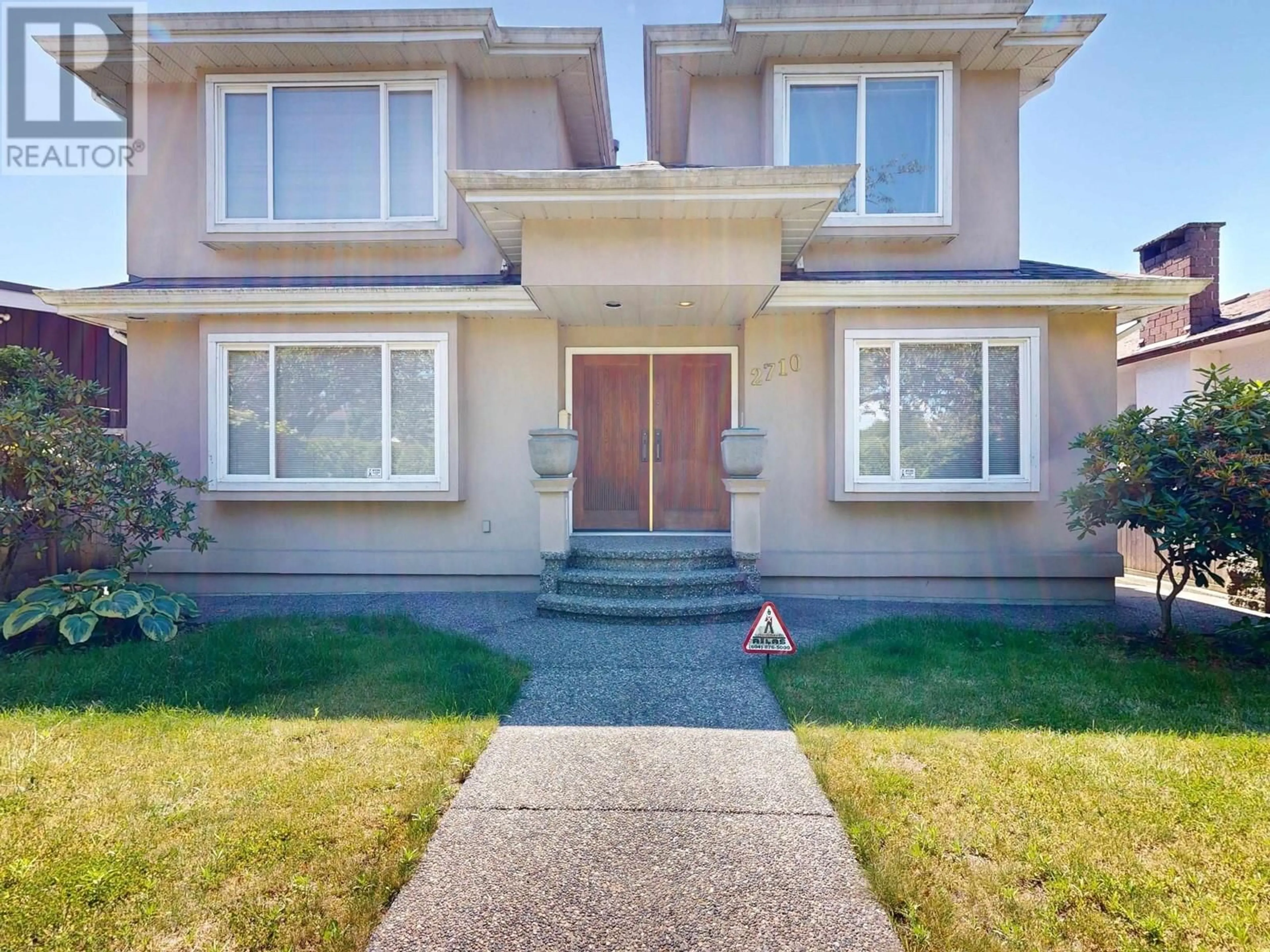 Frontside or backside of a home, the street view for 2710 E 49TH AVENUE, Vancouver British Columbia V5S1K1