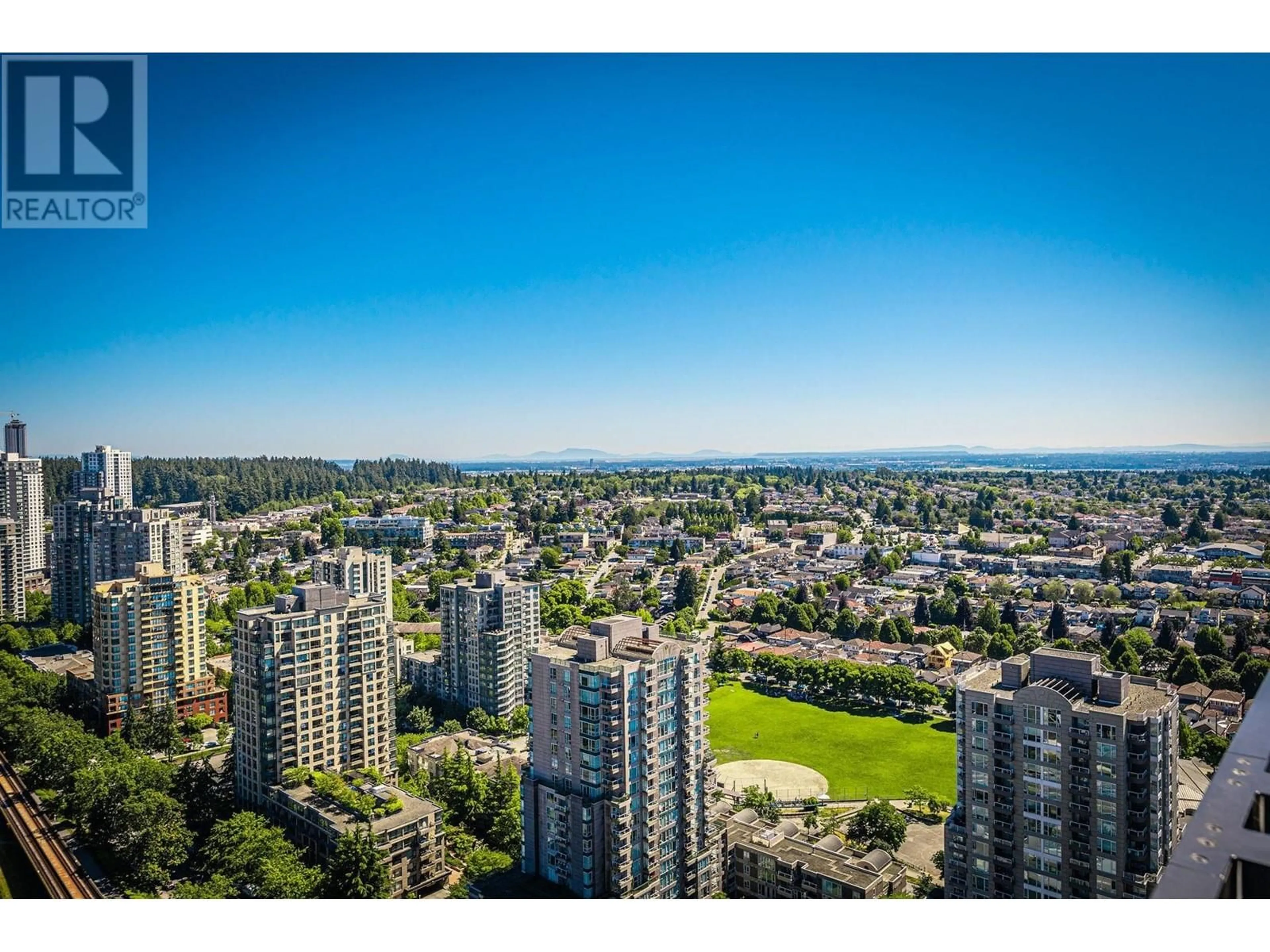 A pic from exterior of the house or condo, the view of city buildings for 403 5058 JOYCE STREET, Vancouver British Columbia V5R0J9