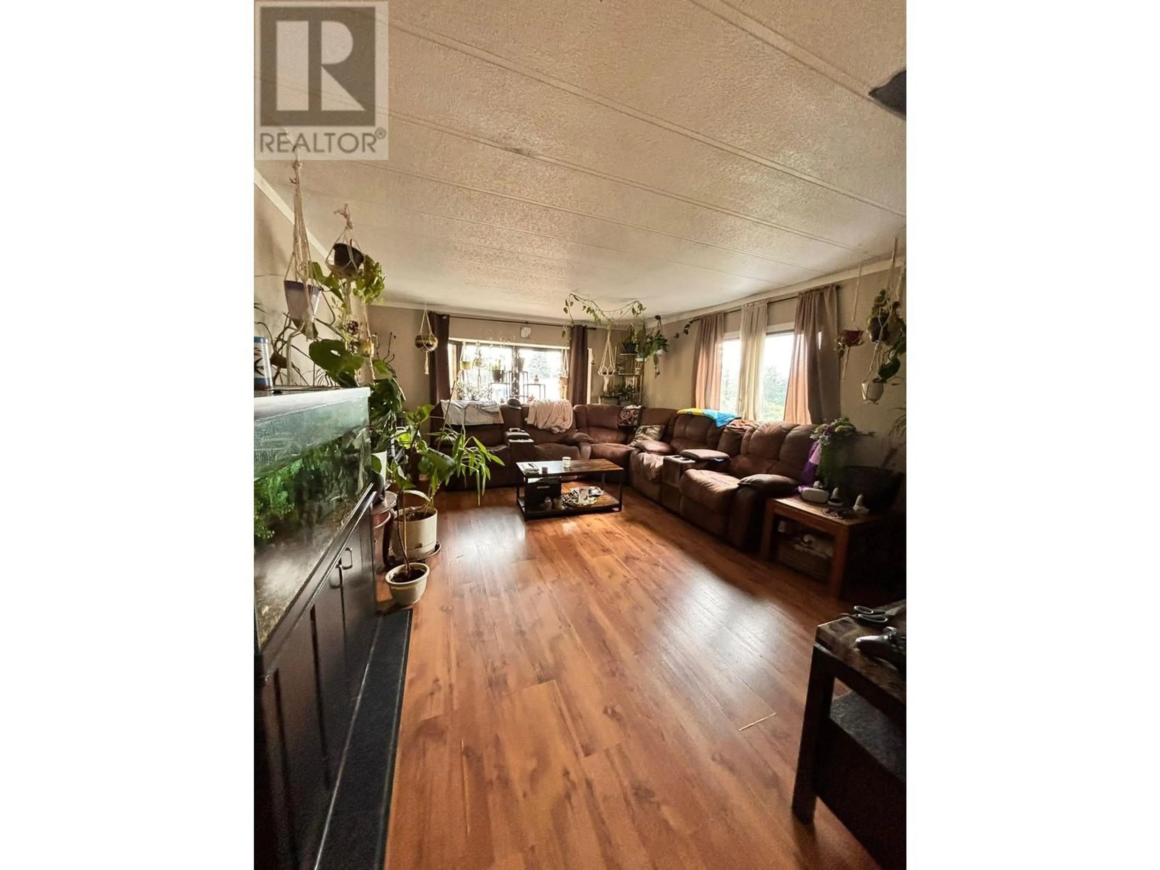 Living room, wood floors for 41 770 11TH AVENUE, Williams Lake British Columbia V2G2N4