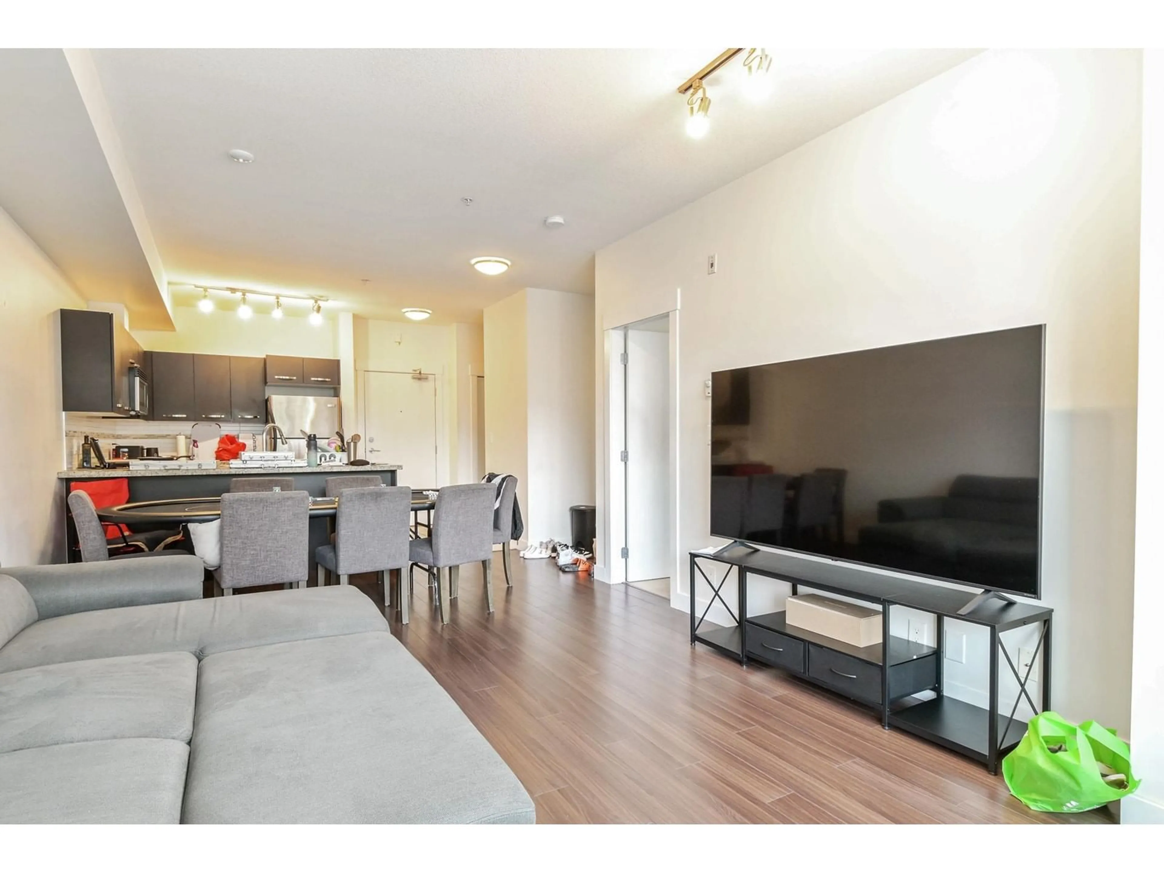 Living room, wood floors for 208 33538 MARSHALL ROAD, Abbotsford British Columbia V2S0C7