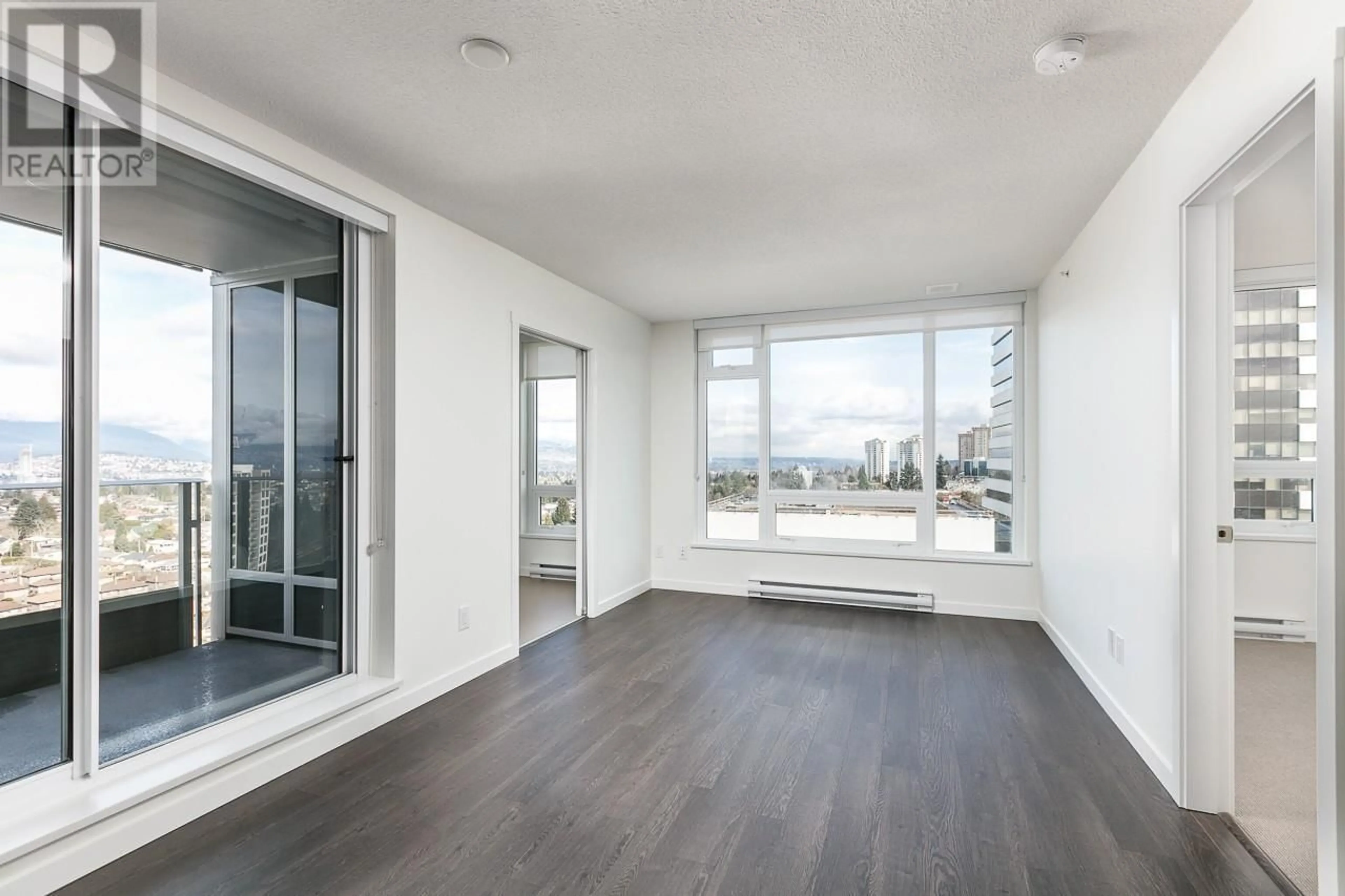 A pic of a room, wood floors for 2204 5665 BOUNDARY ROAD, Vancouver British Columbia V5R0E4