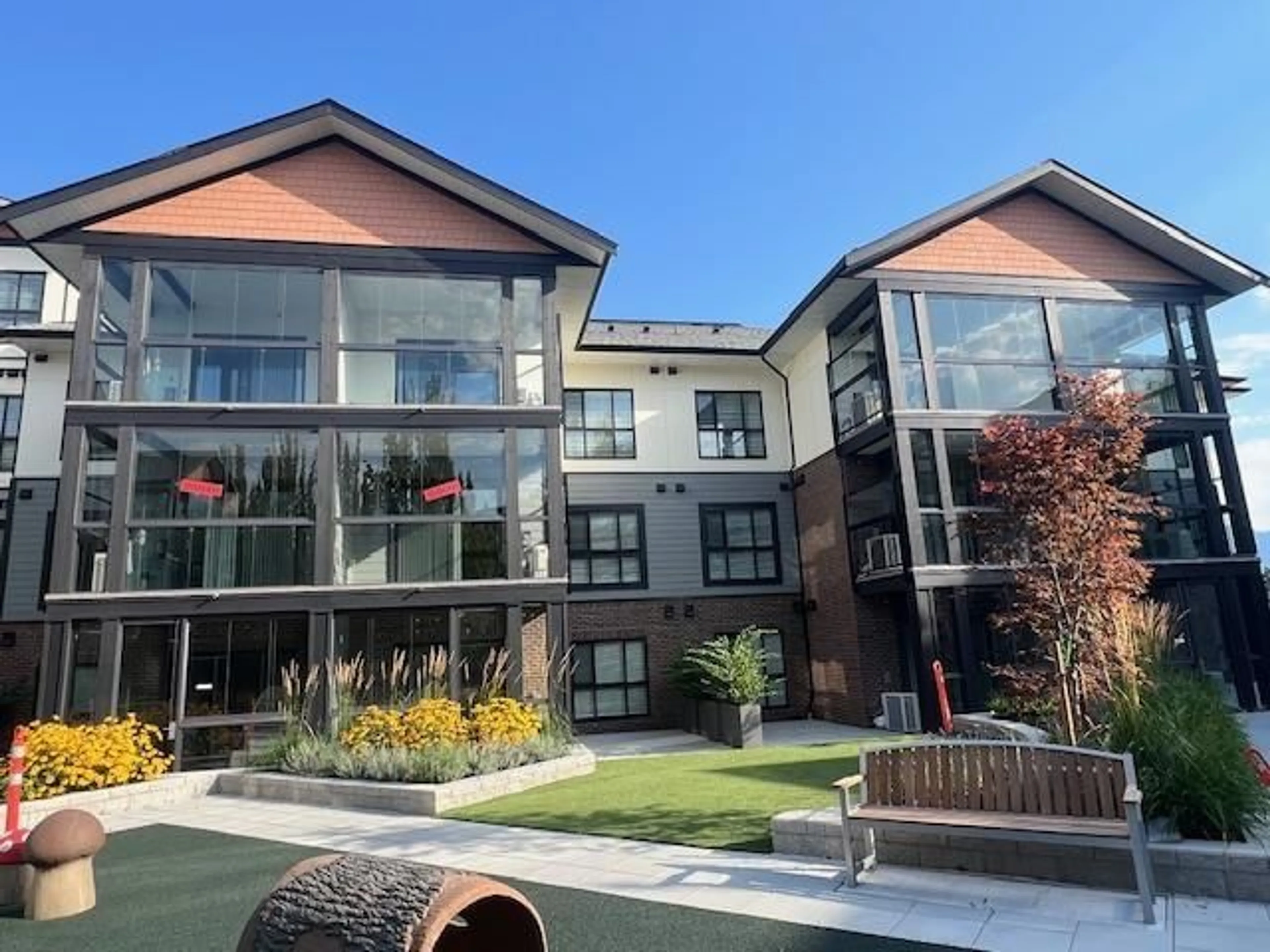 A pic from exterior of the house or condo, the front or back of building for 213 8497 YOUNG ROAD|Chilliwack Proper So, Chilliwack British Columbia V2P0M6