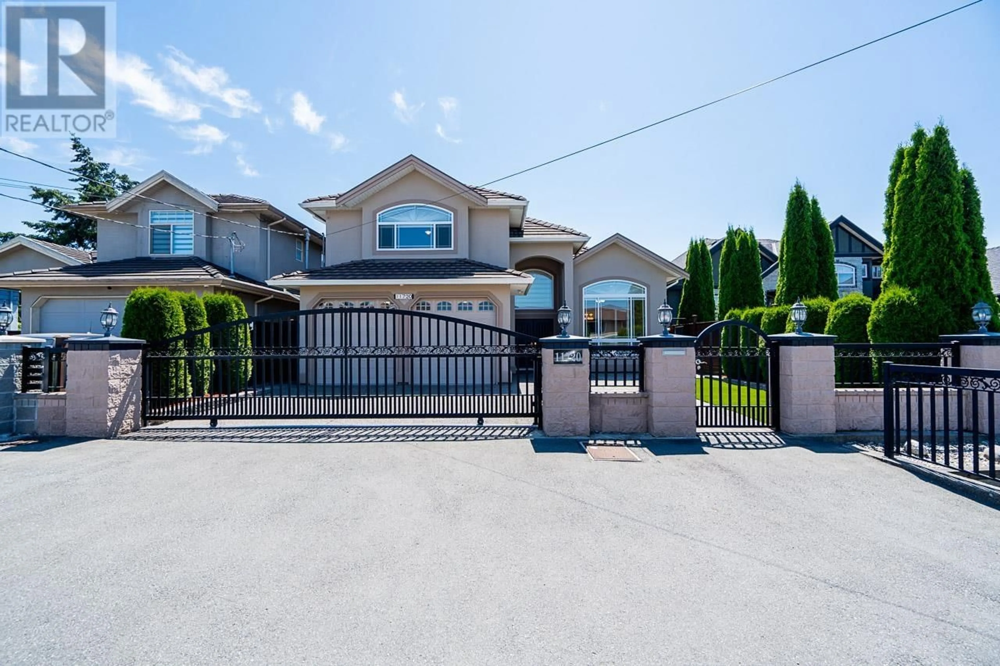 Frontside or backside of a home, the fenced backyard for 11720 MONTEGO STREET, Richmond British Columbia V6X1H4