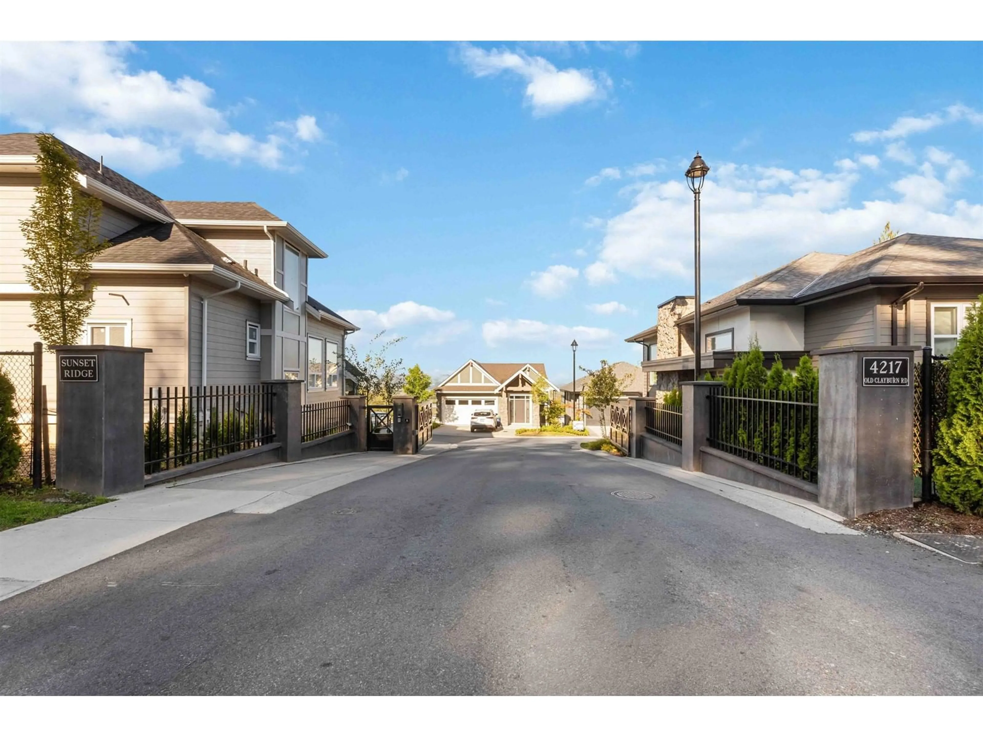 A pic from exterior of the house or condo, the fenced backyard for 34 4217 OLD CLAYBURN ROAD, Abbotsford British Columbia V3G1L5