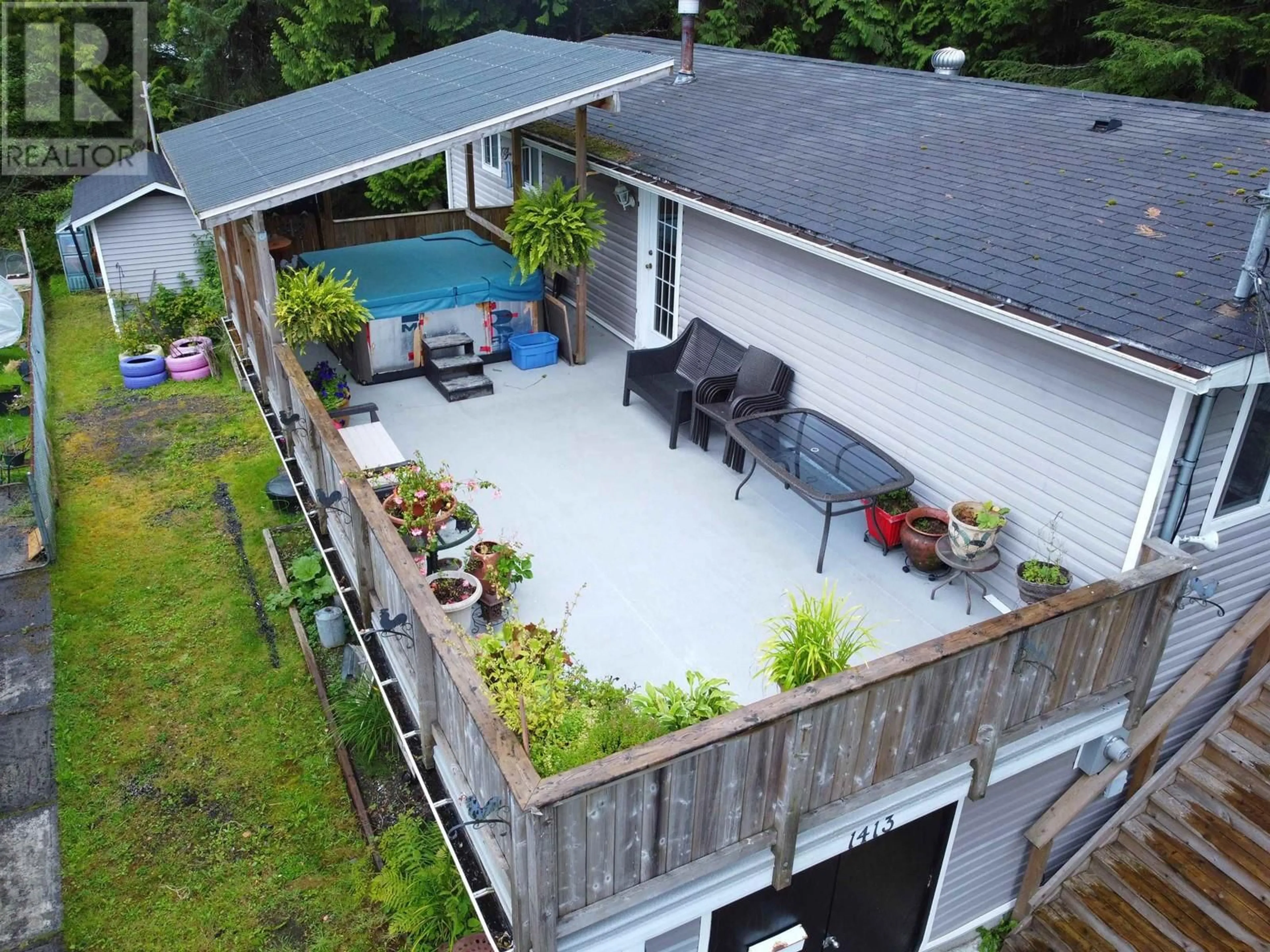 Frontside or backside of a home, the fenced backyard for 1413 PRINCE RUPERT BOULEVARD, Prince Rupert British Columbia V8J3X1