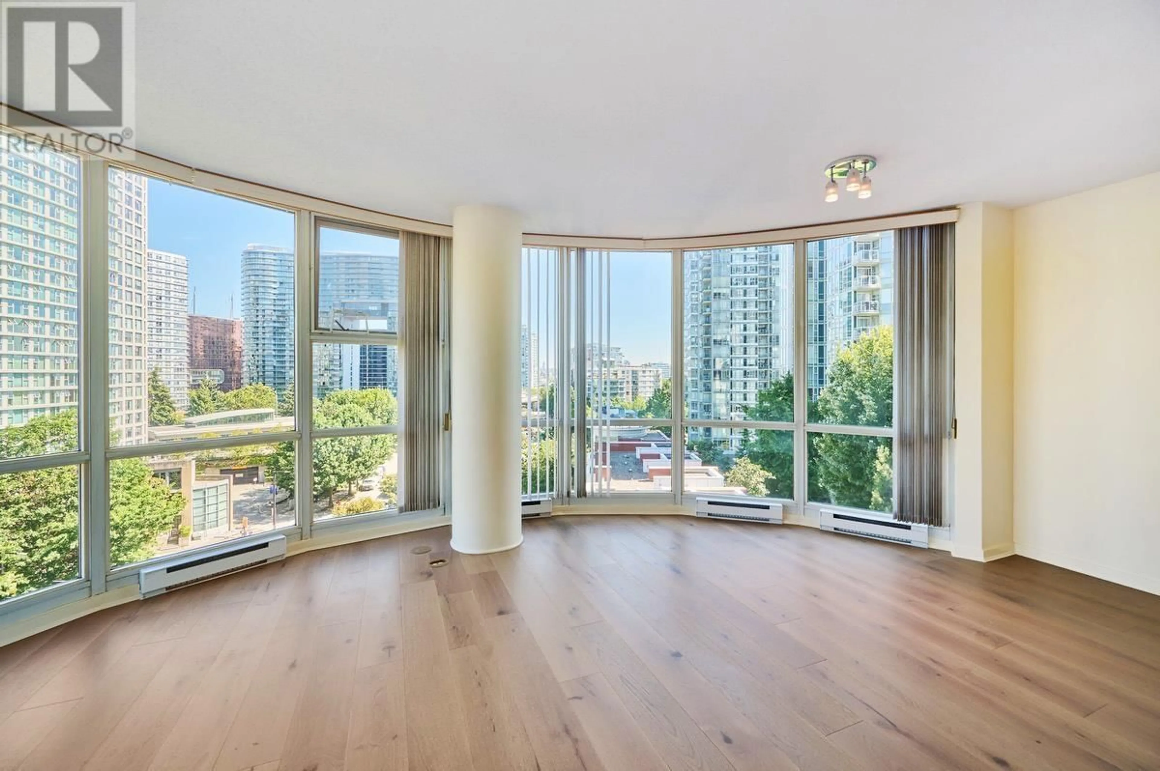 A pic of a room, wood floors for 906 193 AQUARIUS MEWS, Vancouver British Columbia V6Z2Z2