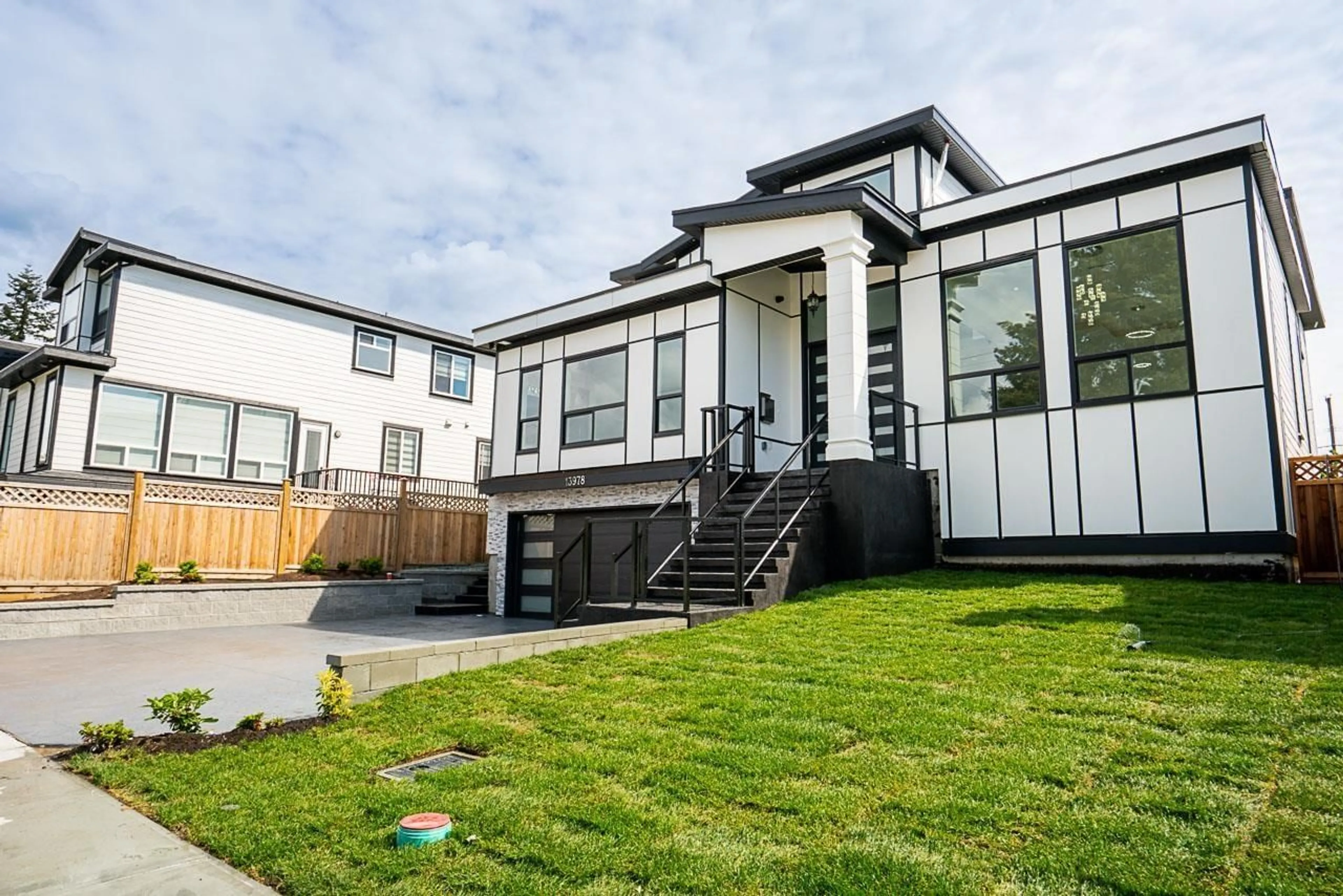 Frontside or backside of a home, the fenced backyard for 13978 113A AVENUE, Surrey British Columbia V3R2K2