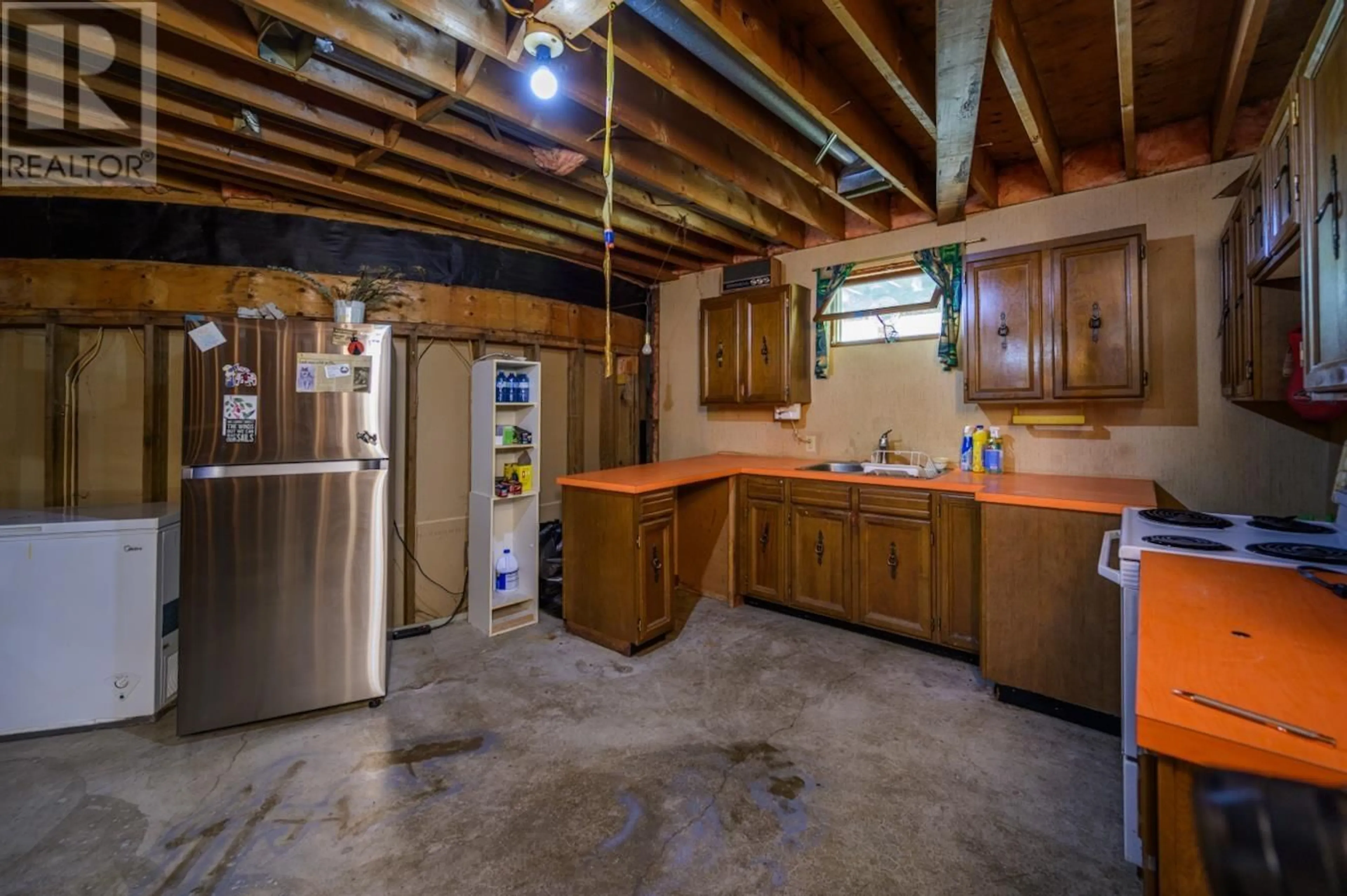 Kitchen, cement floor, cottage for 7960 SUTLEY ROAD, Prince George British Columbia V2N5W2