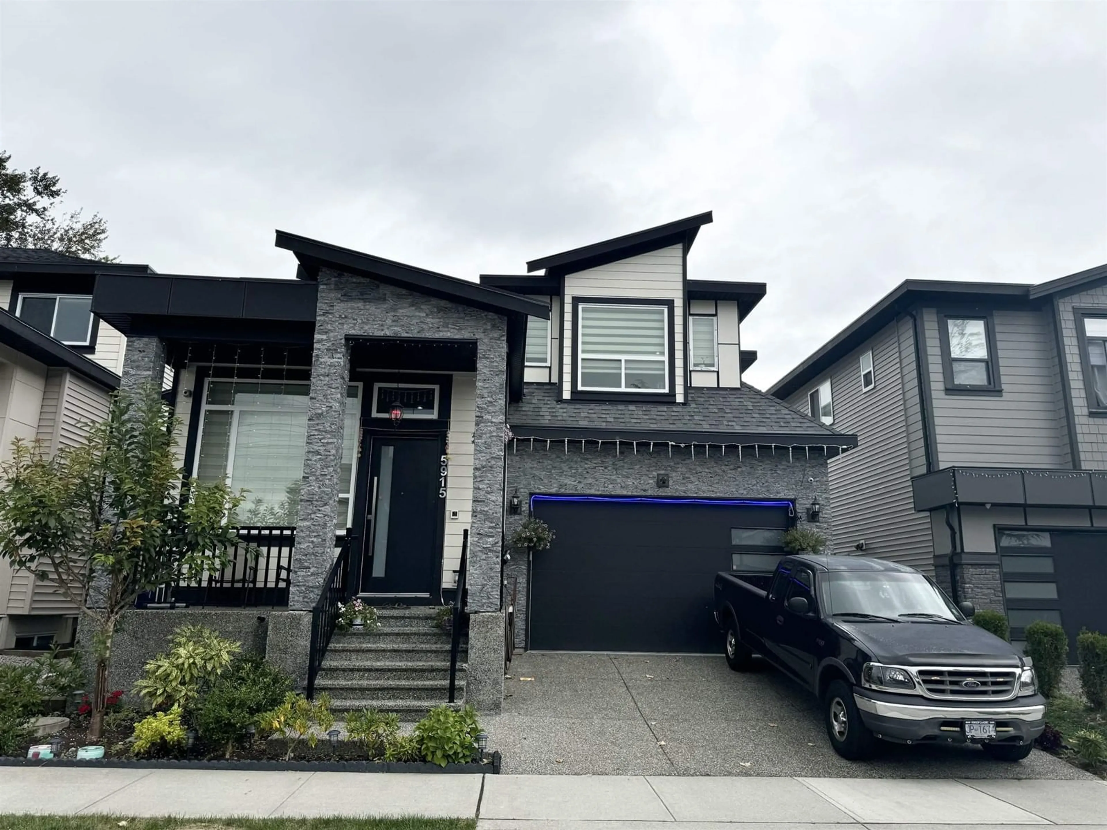 Frontside or backside of a home, the street view for 5915 141 STREET, Surrey British Columbia V3X0J3