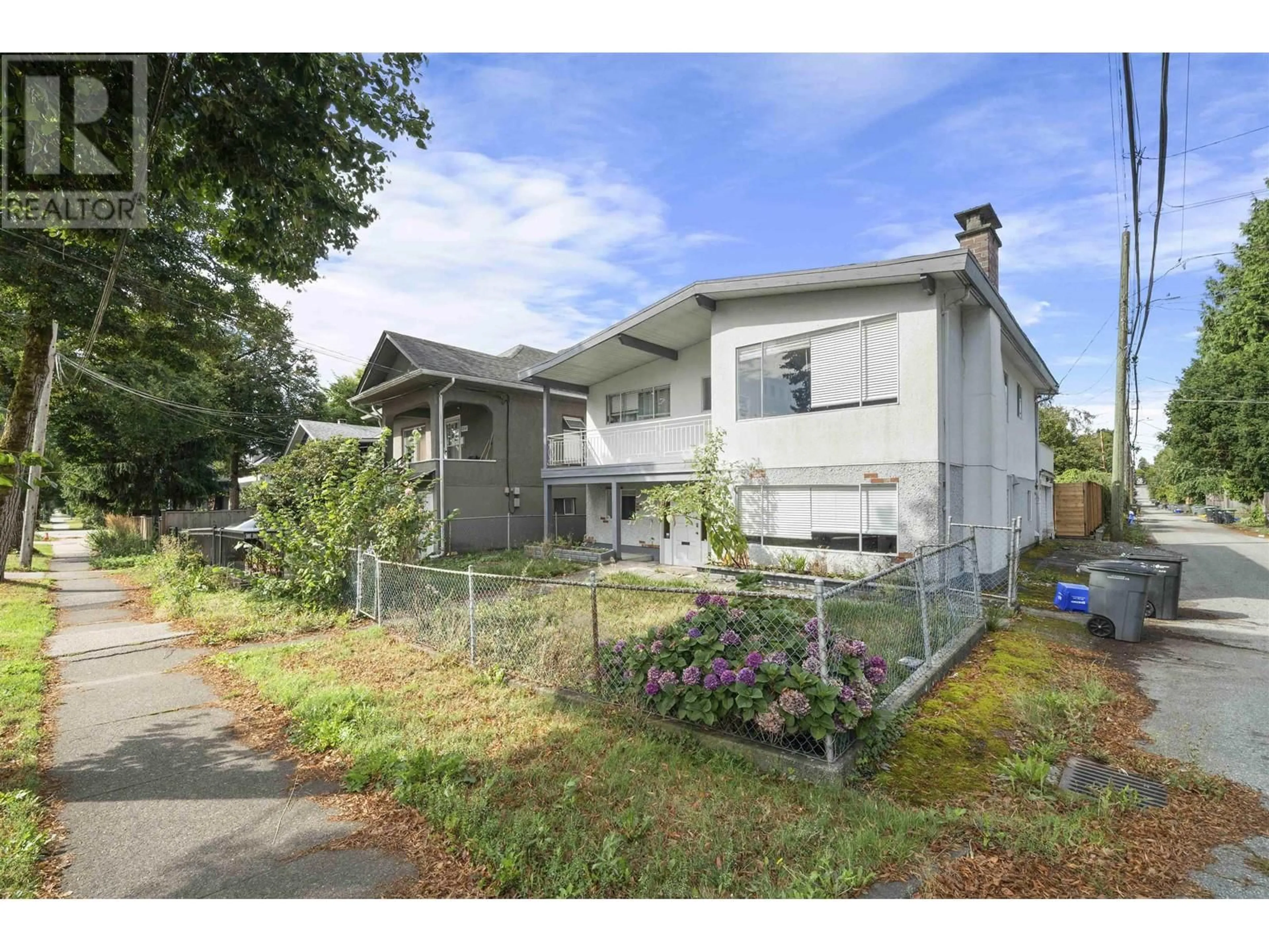 Frontside or backside of a home, the fenced backyard for 3225 ST. GEORGE STREET, Vancouver British Columbia V5V3Z6