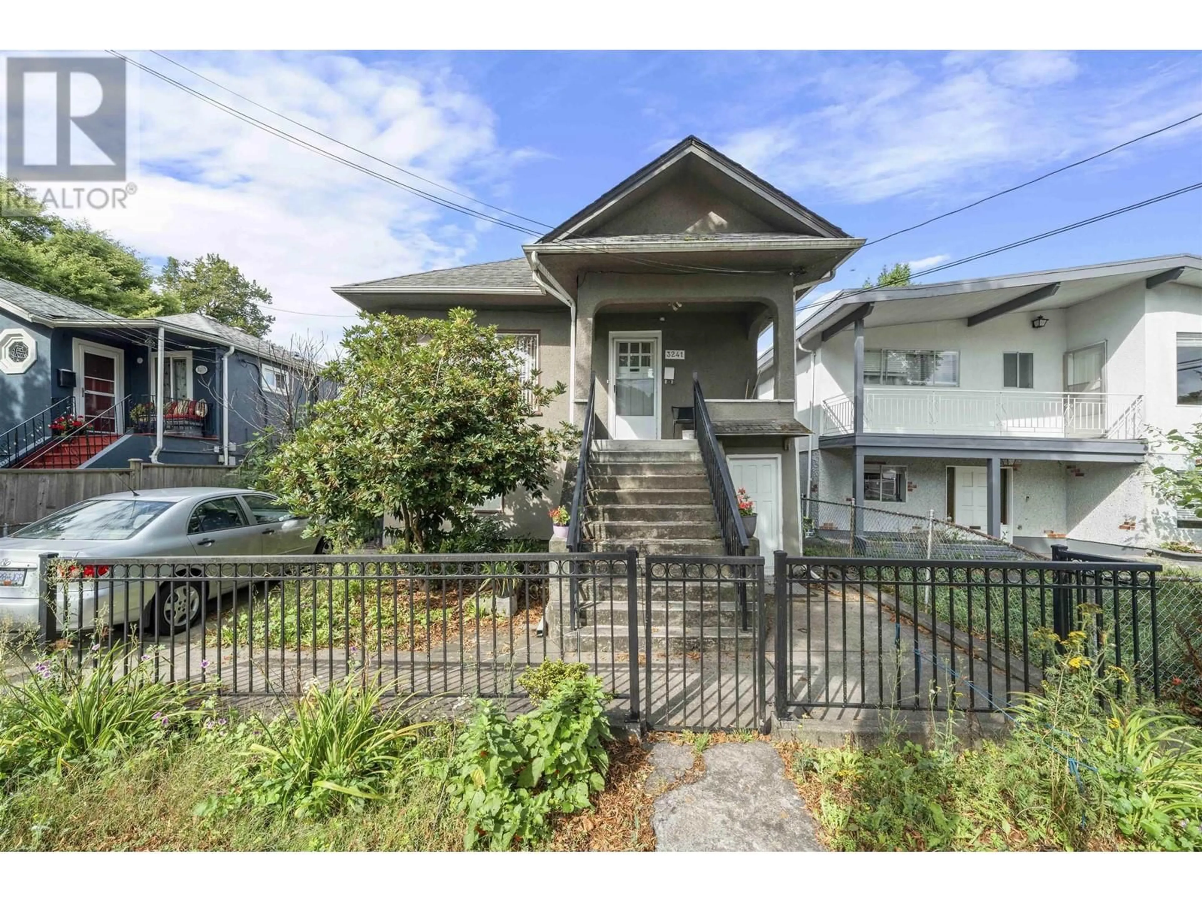 Frontside or backside of a home, the fenced backyard for 3241 ST. GEORGE STREET, Vancouver British Columbia V5V3Z6