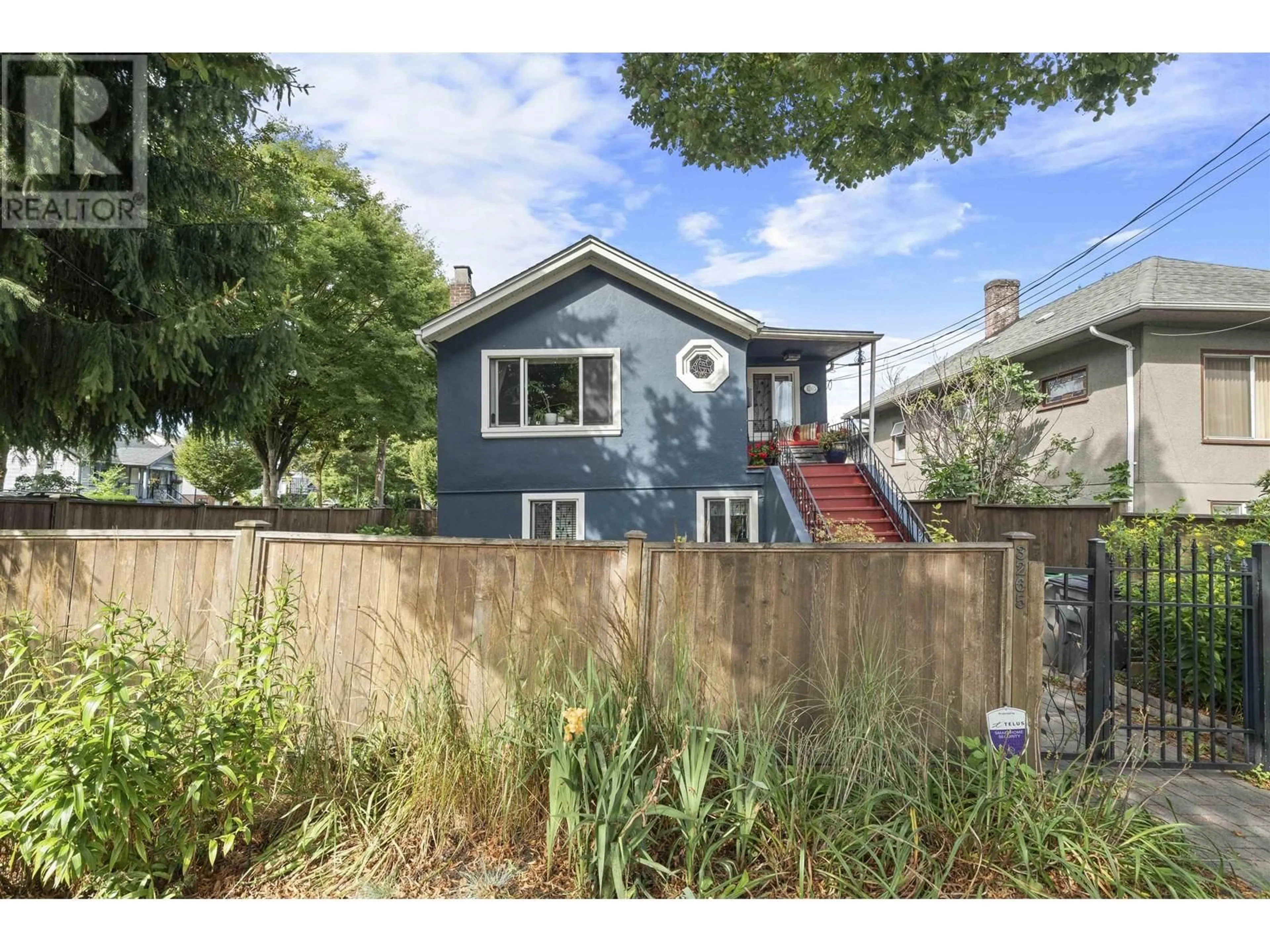 Frontside or backside of a home, the fenced backyard for 3265 ST. GEORGE STREET, Vancouver British Columbia V5V3Z6