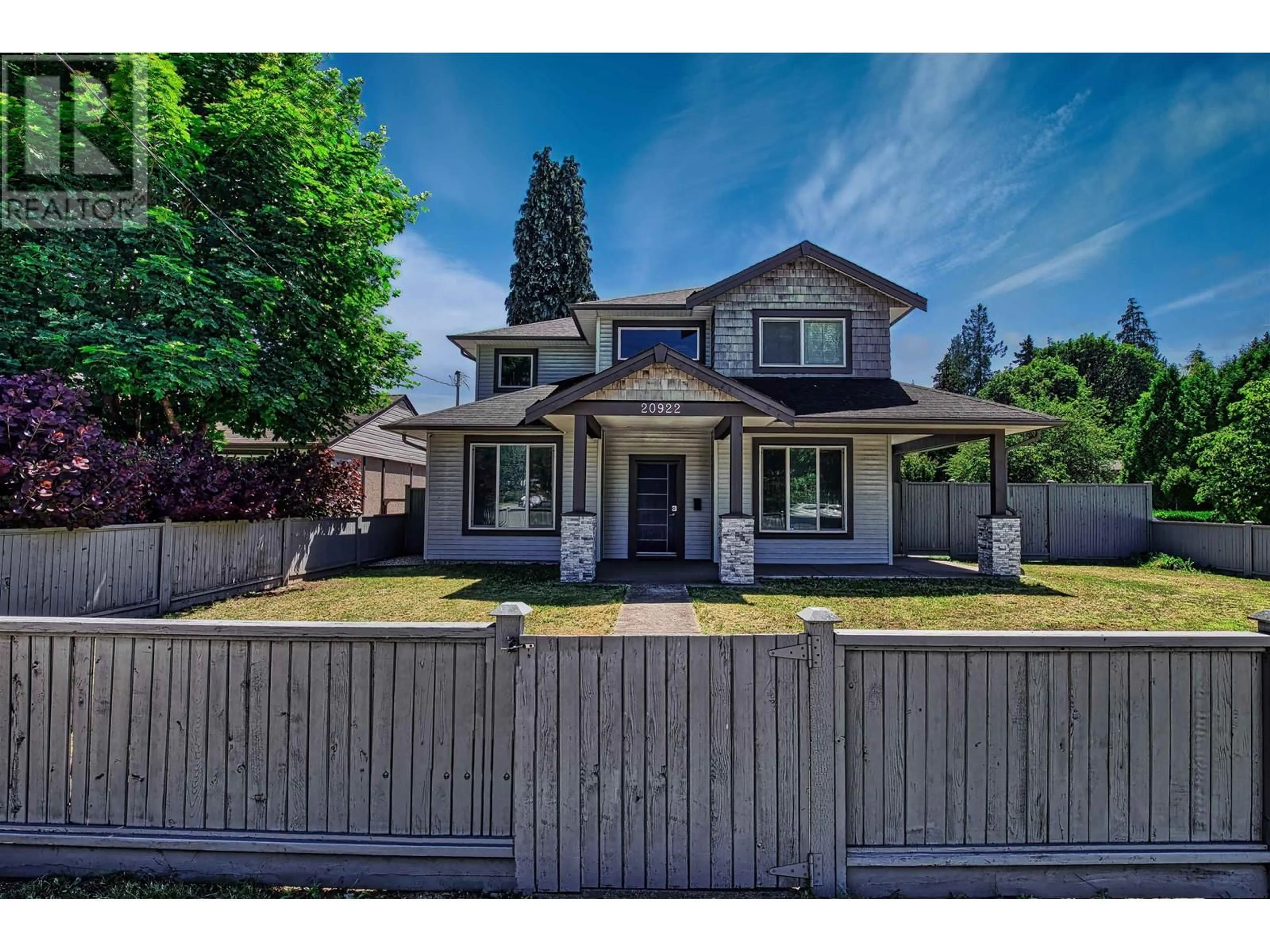 Frontside or backside of a home, the fenced backyard for 20922 DEWDNEY TRUNK ROAD, Maple Ridge British Columbia V2X3E8