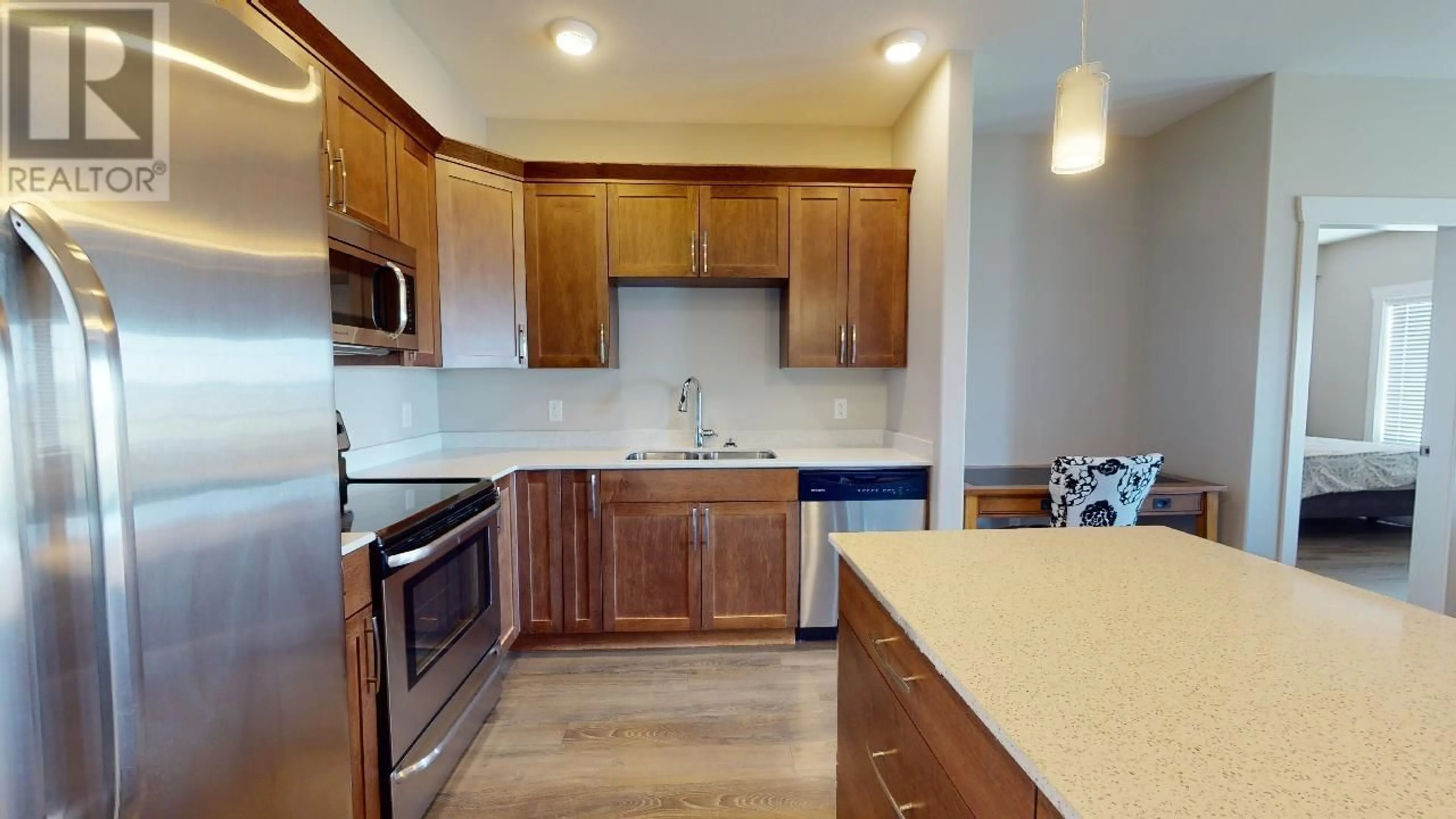 Standard kitchen, wood floors for 307 11205 105 AVENUE, Fort St. John British Columbia V1J0L3