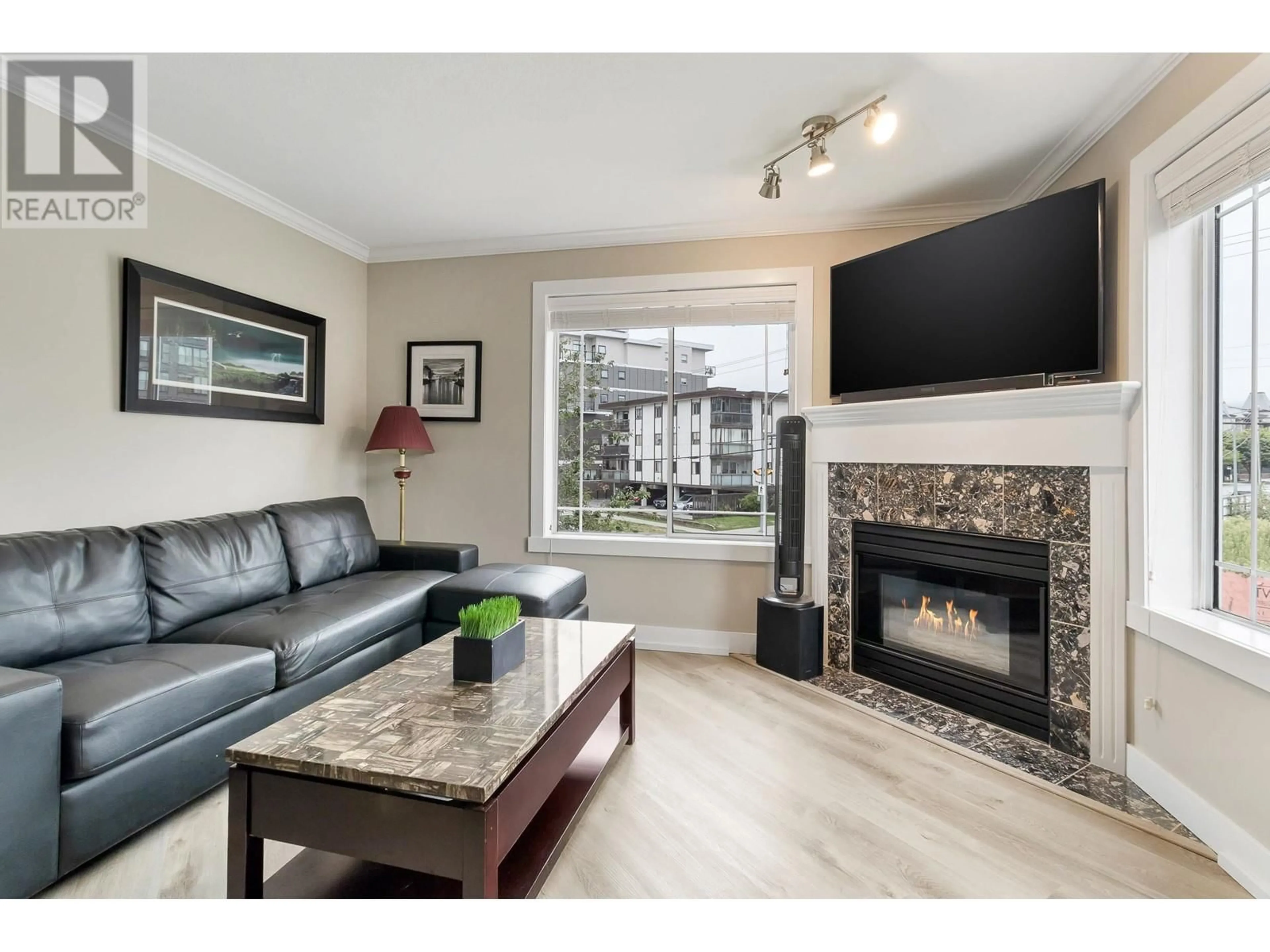 Living room, wood floors for 201 2380 SHAUGHNESSY STREET, Port Coquitlam British Columbia V3C3E3