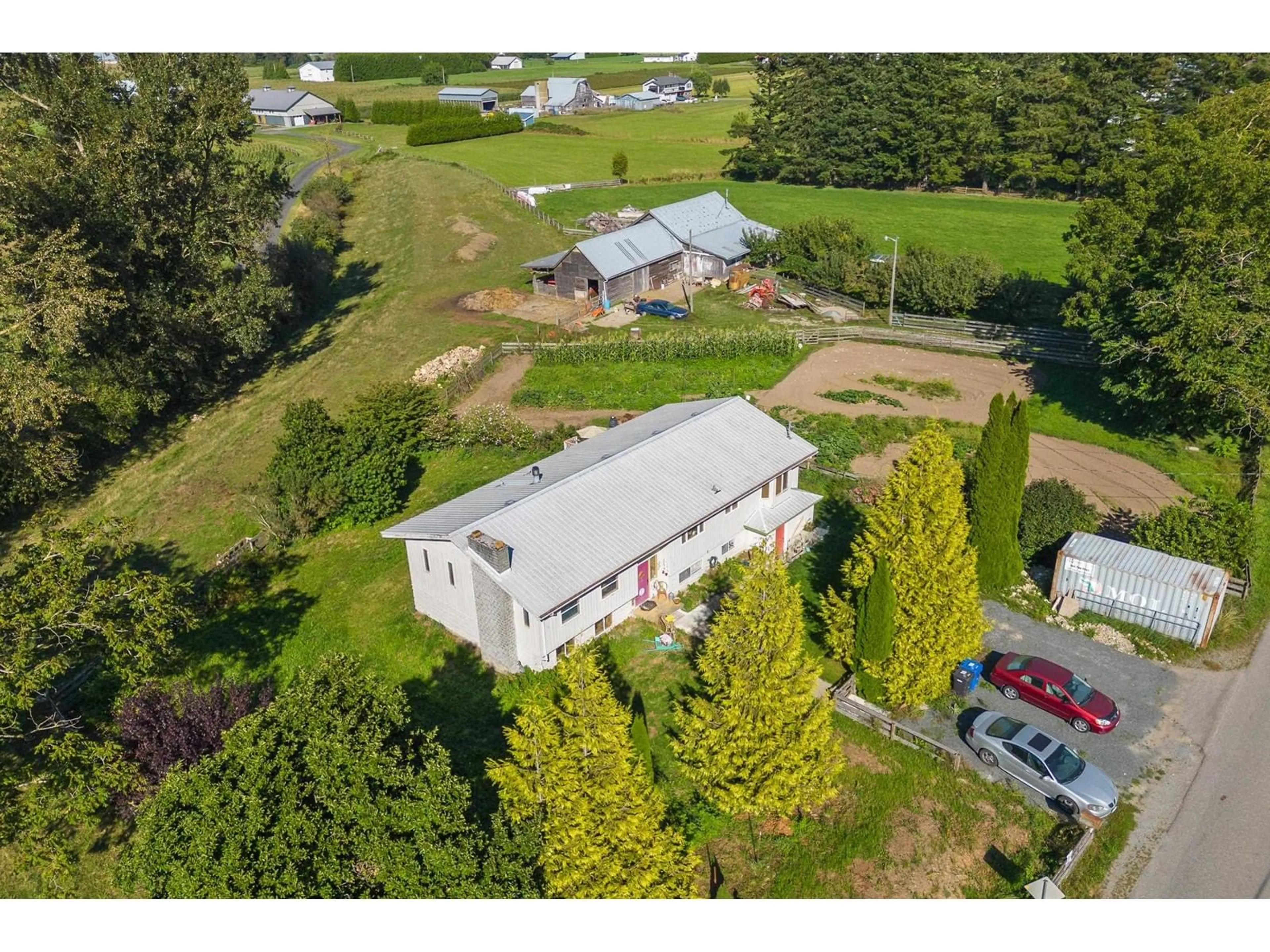 Frontside or backside of a home, the fenced backyard for 38489 OLD YALE ROAD, Abbotsford British Columbia V3G1X4