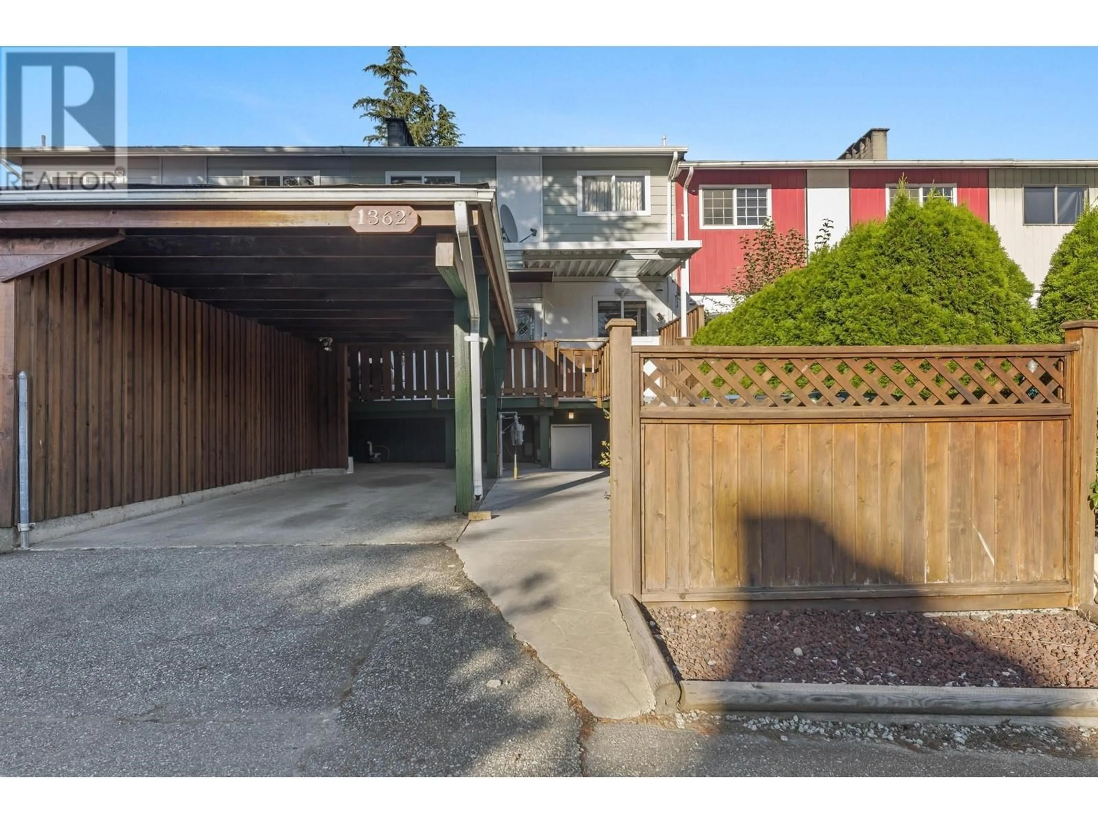 A pic from exterior of the house or condo, the fenced backyard for 1362 UNA WAY, Port Coquitlam British Columbia V3C2V2