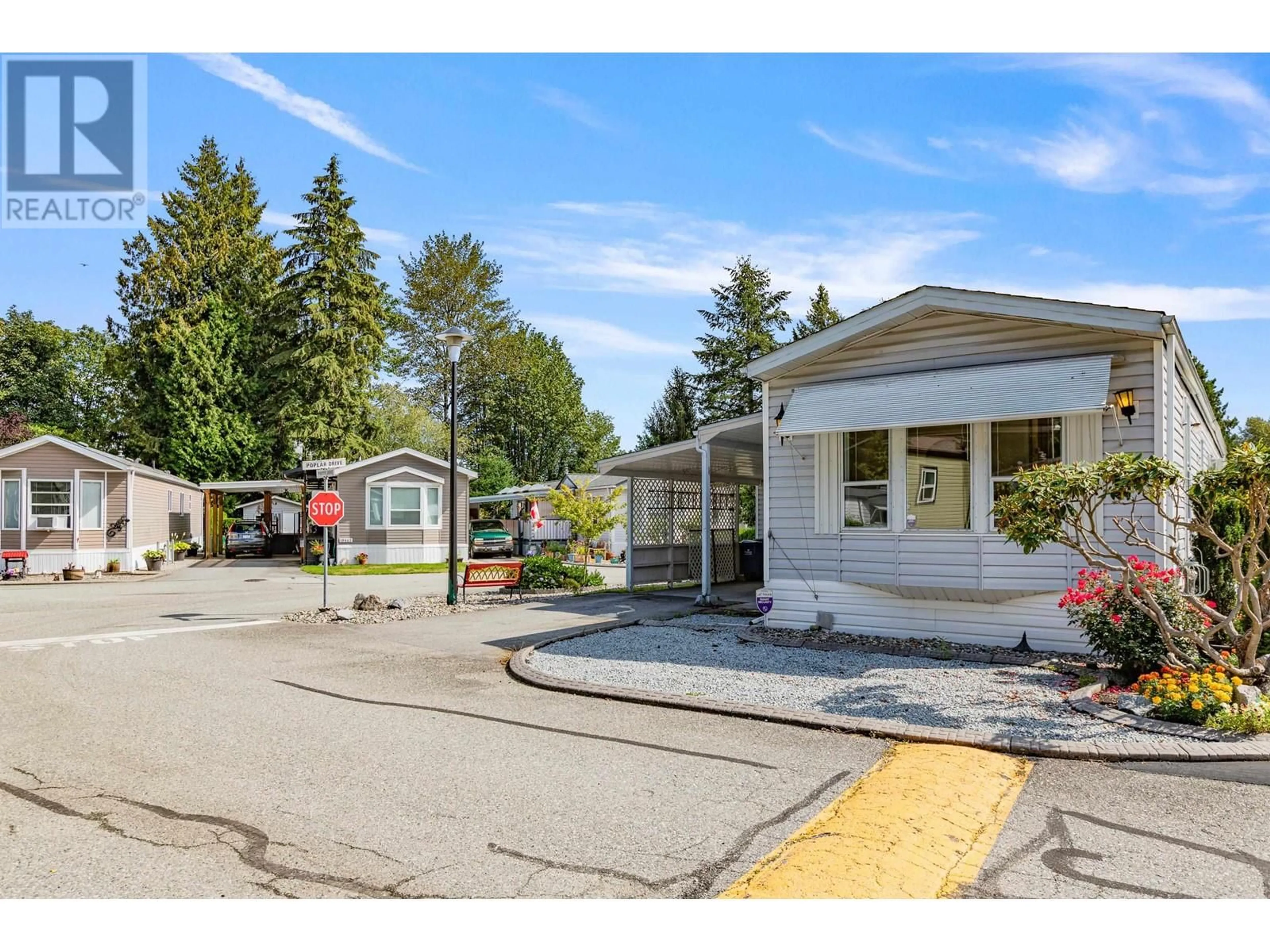 A pic from exterior of the house or condo, the street view for 122 11970 PINYON DRIVE, Pitt Meadows British Columbia V3Y1Z3