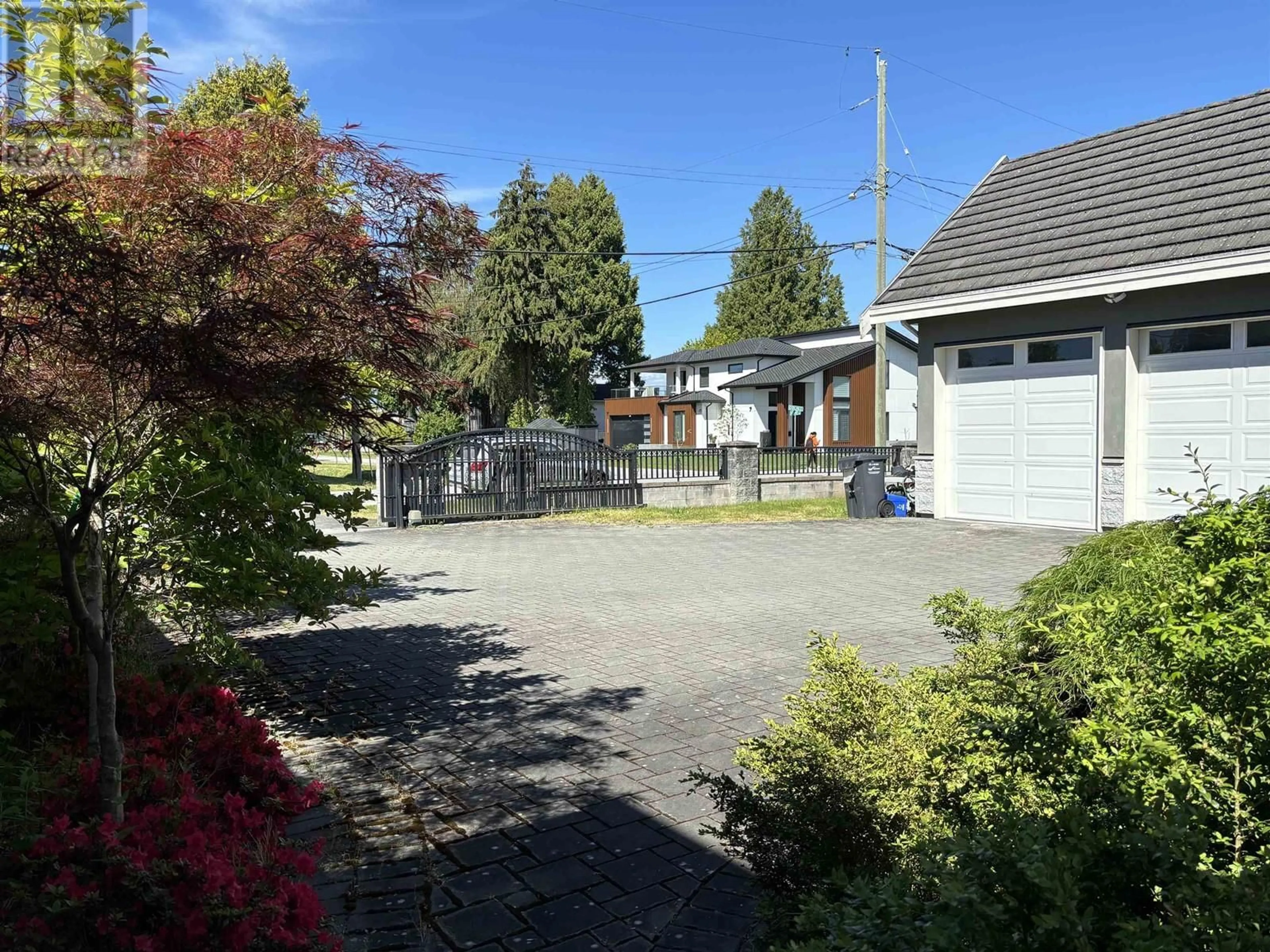 Frontside or backside of a home, the fenced backyard for 8460 ODLIN CRESCENT, Richmond British Columbia V6X1E8