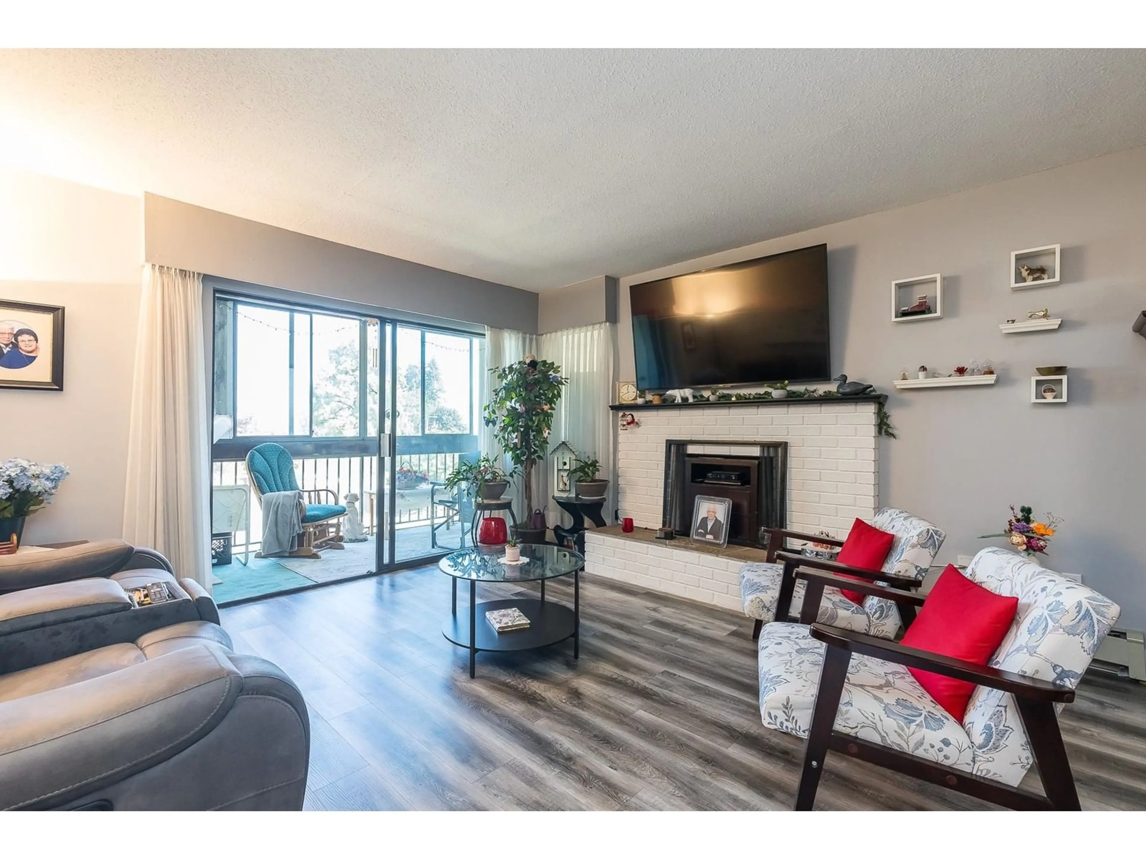 Living room, wood floors for 215 2277 MCCALLUM ROAD, Abbotsford British Columbia V2S6H9