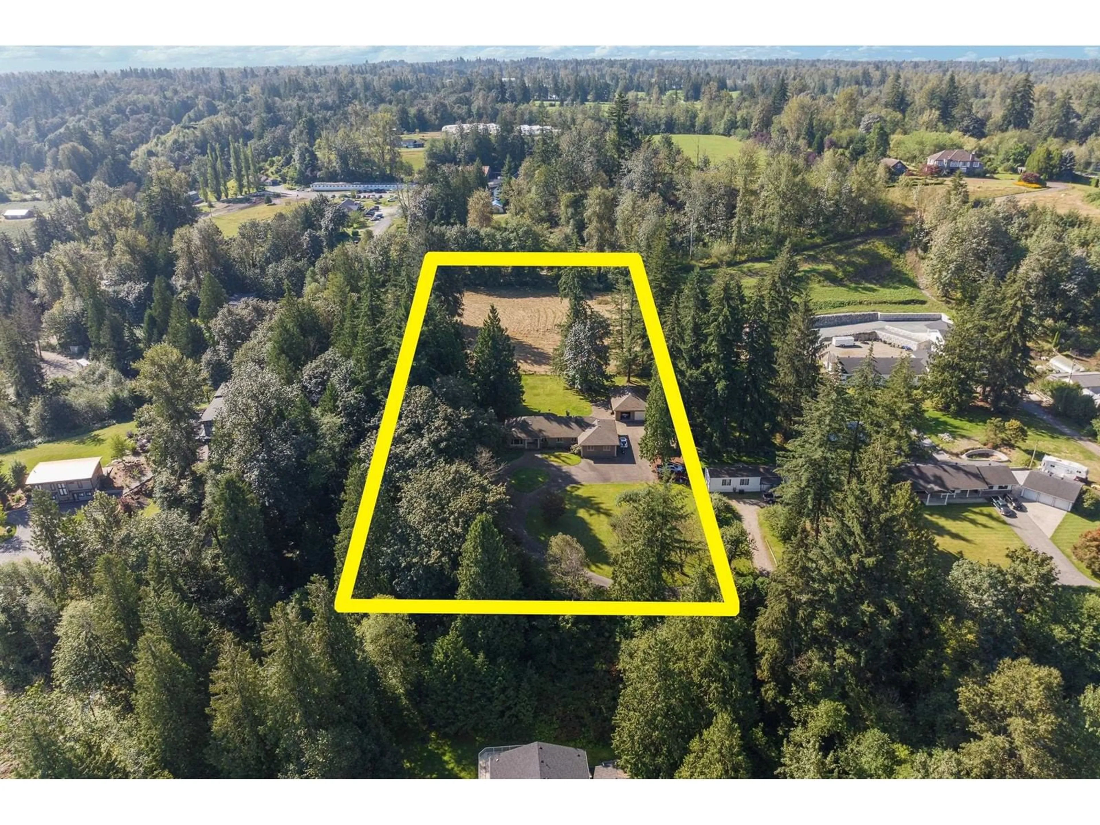 Frontside or backside of a home, the fenced backyard for 26210 84 AVENUE, Langley British Columbia V1M3M6