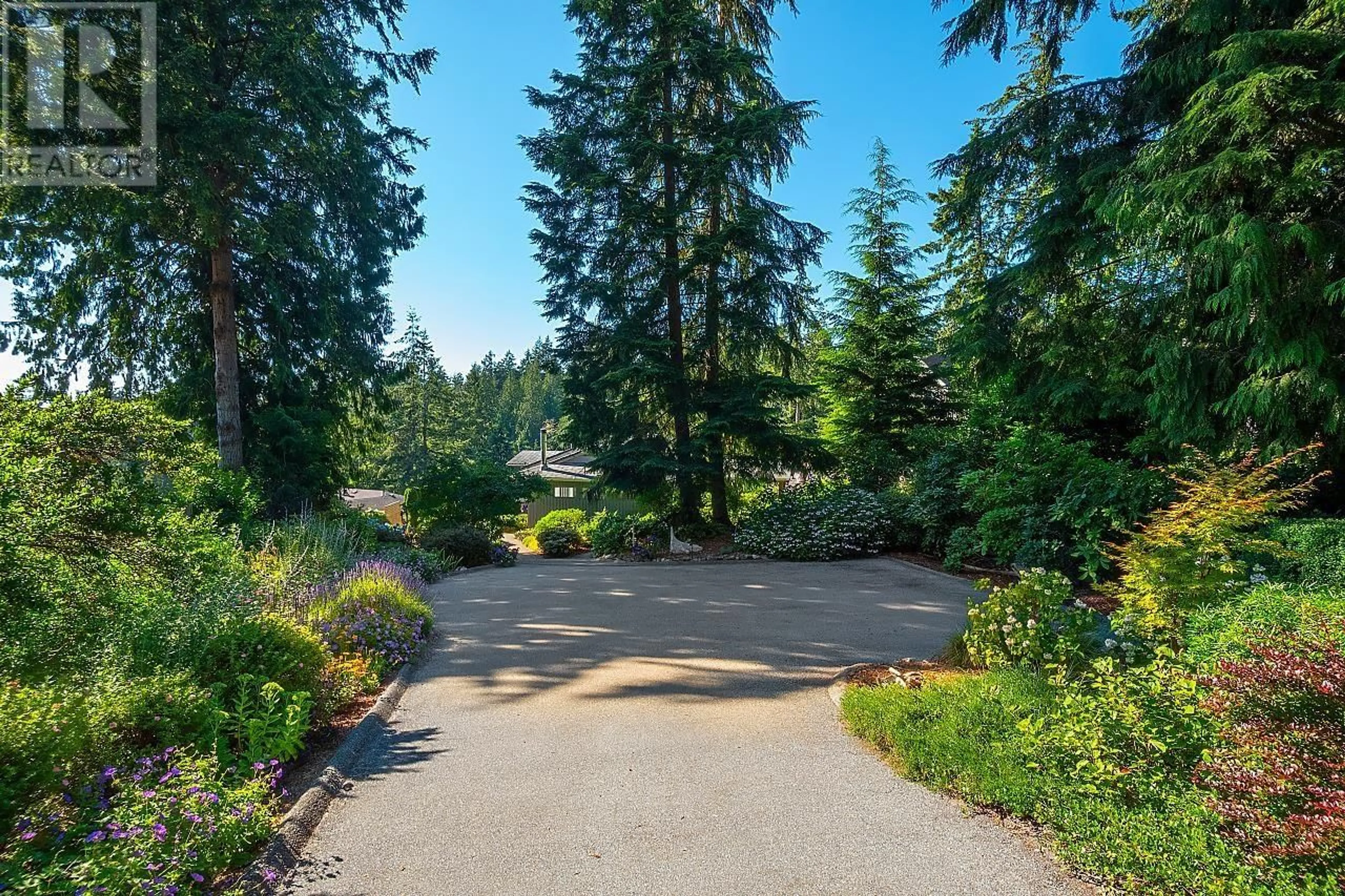 Patio, the fenced backyard for 1526 WHITESAILS DRIVE, Bowen Island British Columbia V0N1G2