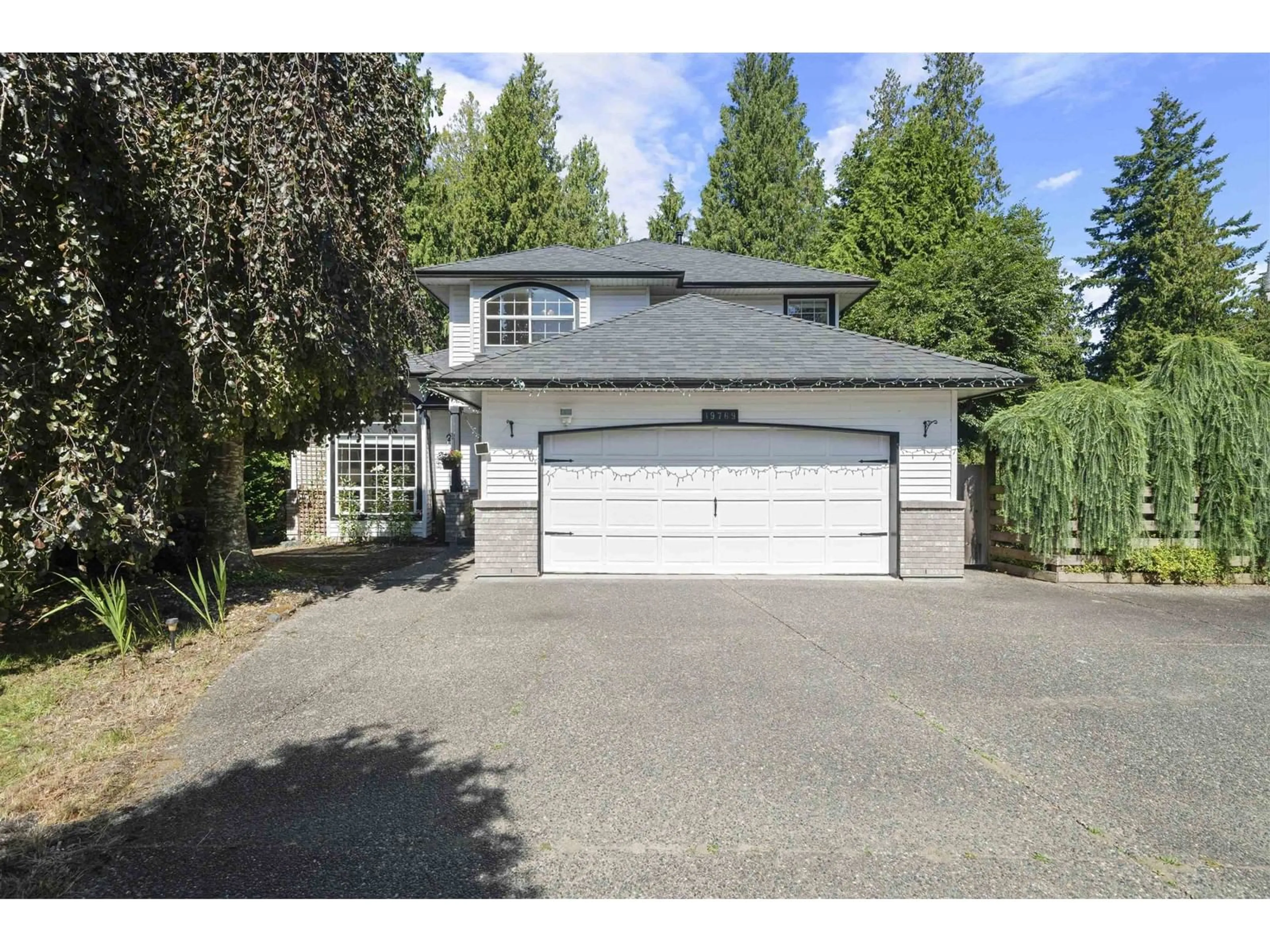 Frontside or backside of a home for 19769 43 AVENUE, Langley British Columbia V3A8G1