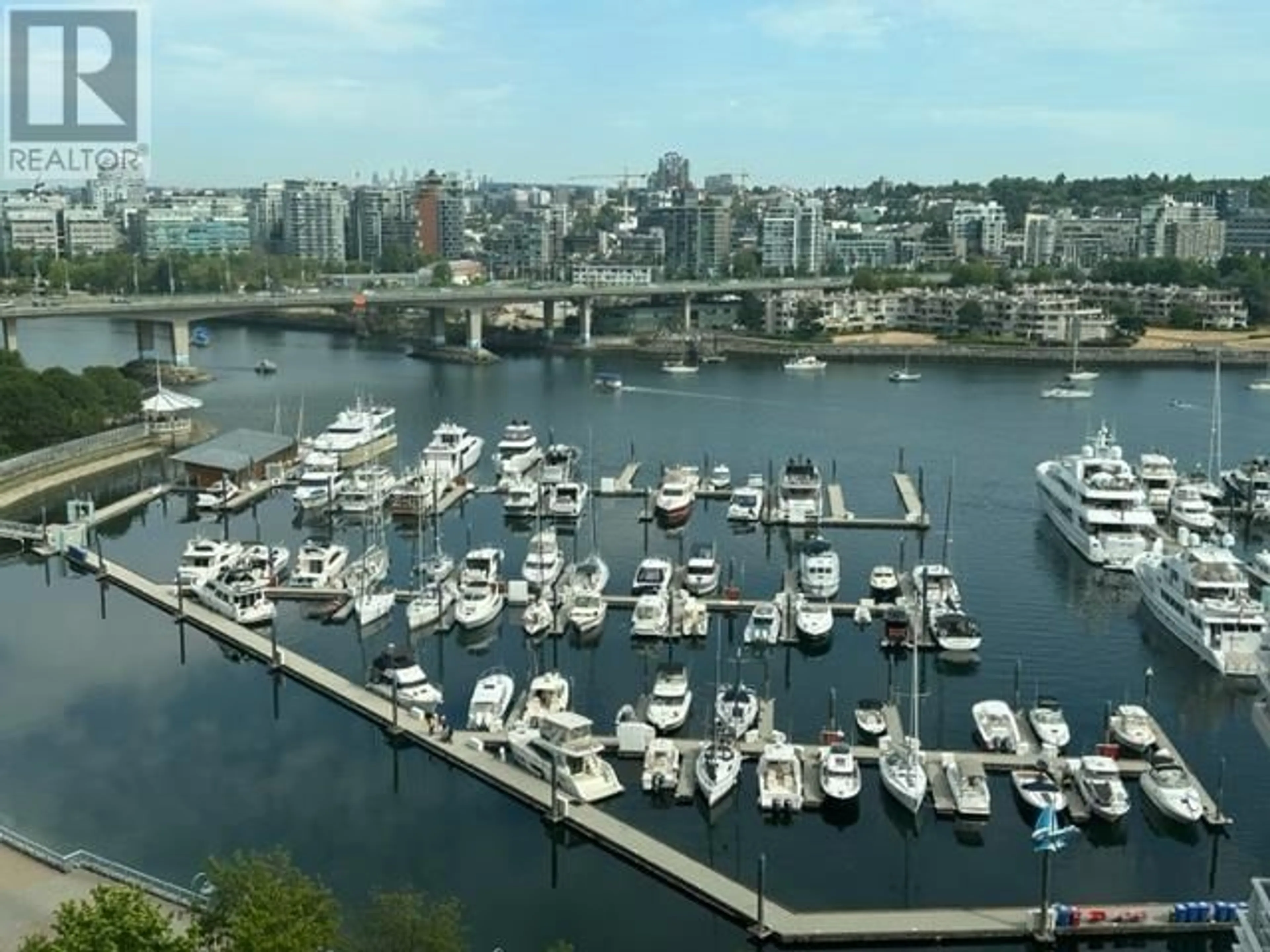 A pic from exterior of the house or condo, lake for 1703 1199 MARINASIDE CRESCENT, Vancouver British Columbia V6Z2Y2