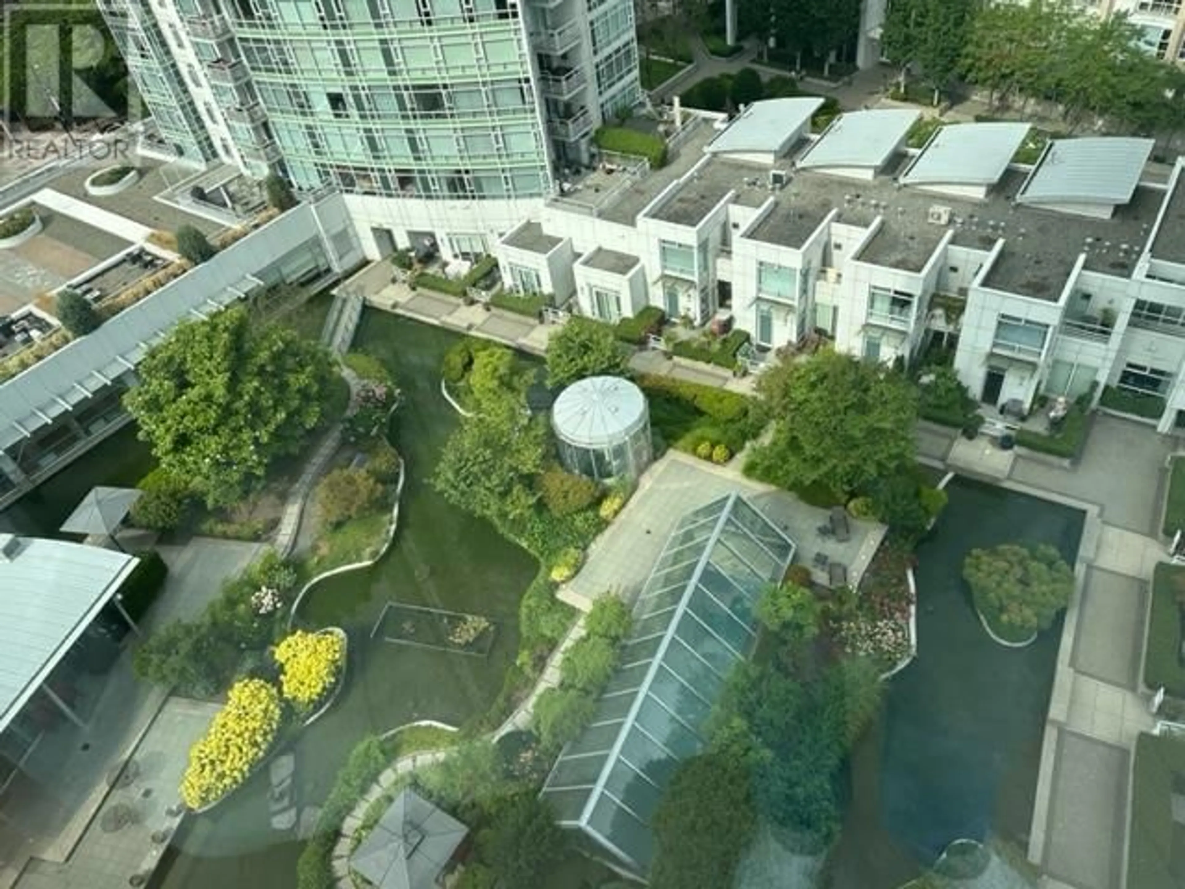 A pic from exterior of the house or condo, the street view for 1703 1199 MARINASIDE CRESCENT, Vancouver British Columbia V6Z2Y2