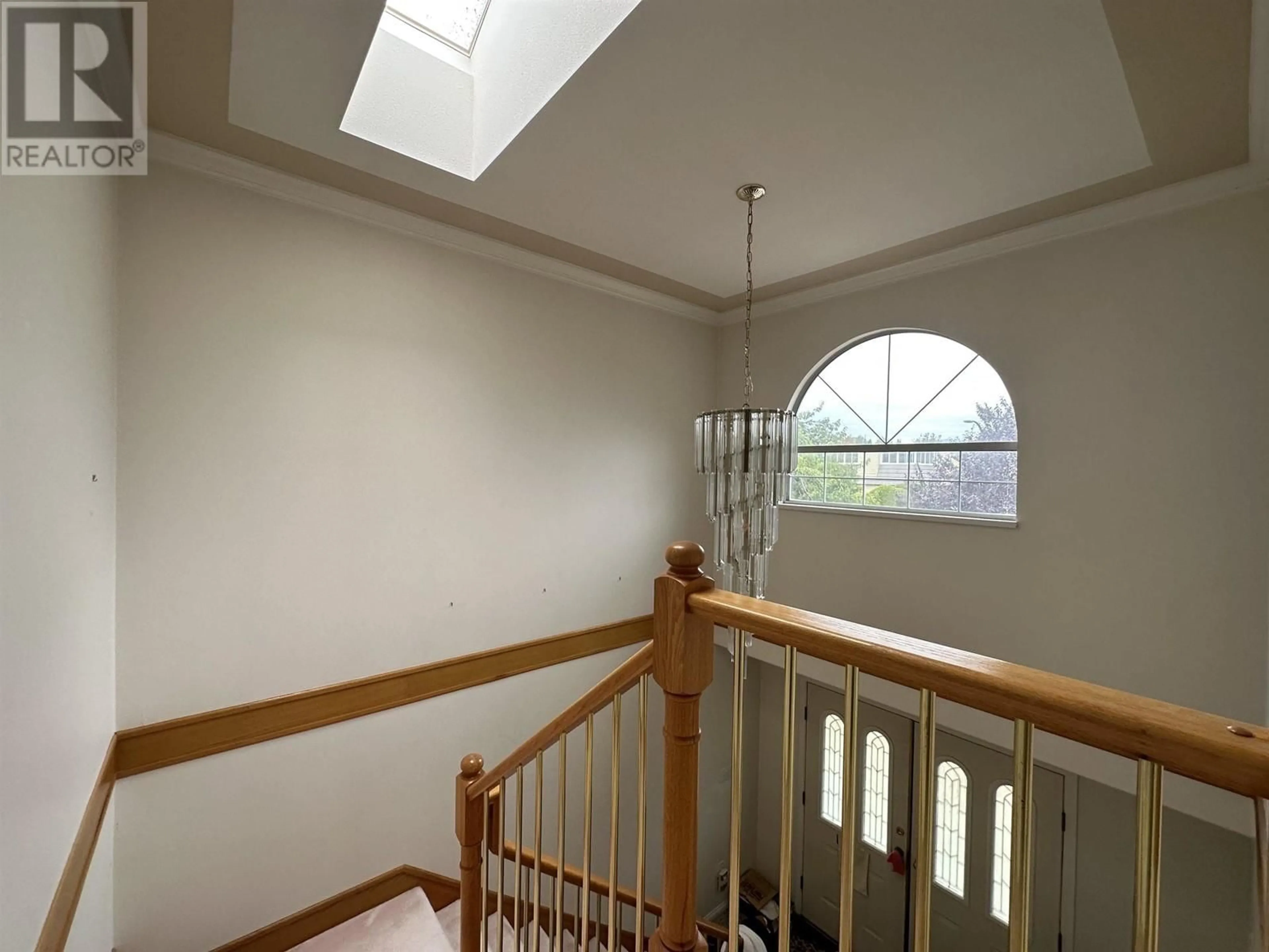 Indoor foyer, wood floors for 128 W 48TH AVENUE, Vancouver British Columbia V5Y2Y7