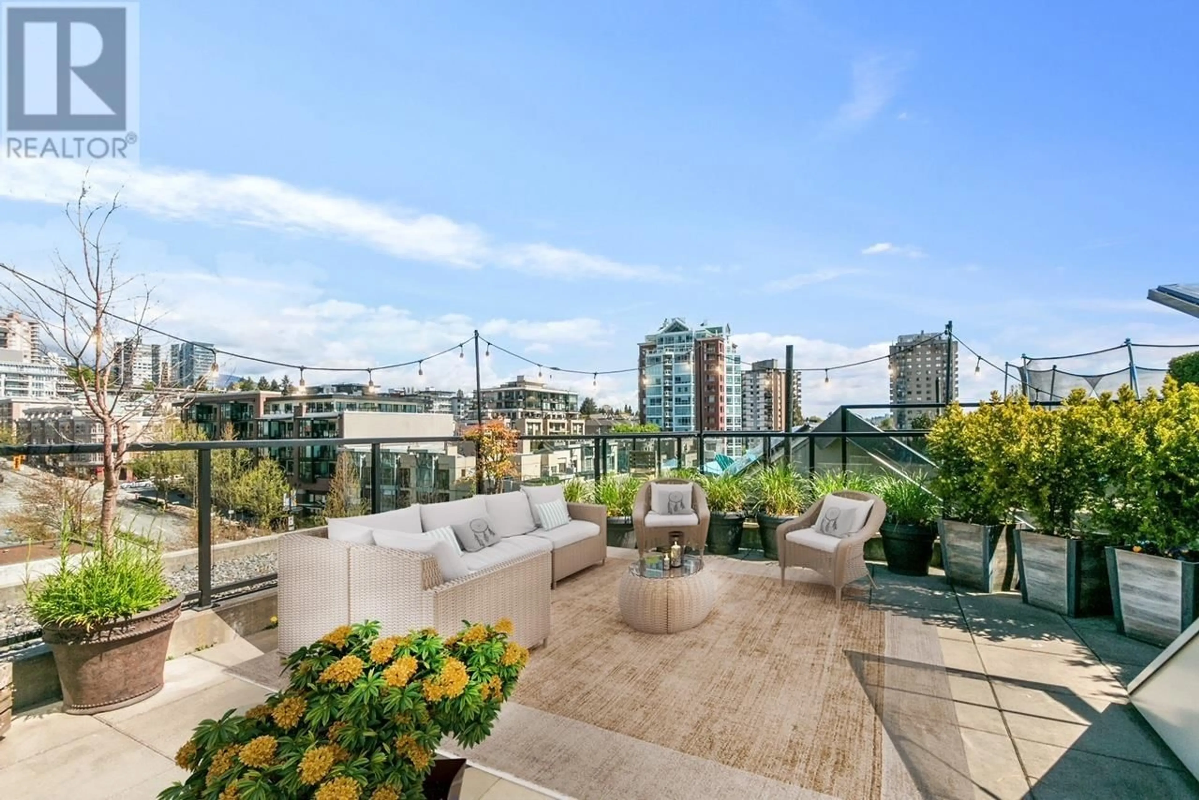 Patio, city buildings view from balcony for 504 105 W 2ND STREET, North Vancouver British Columbia V7M0E3