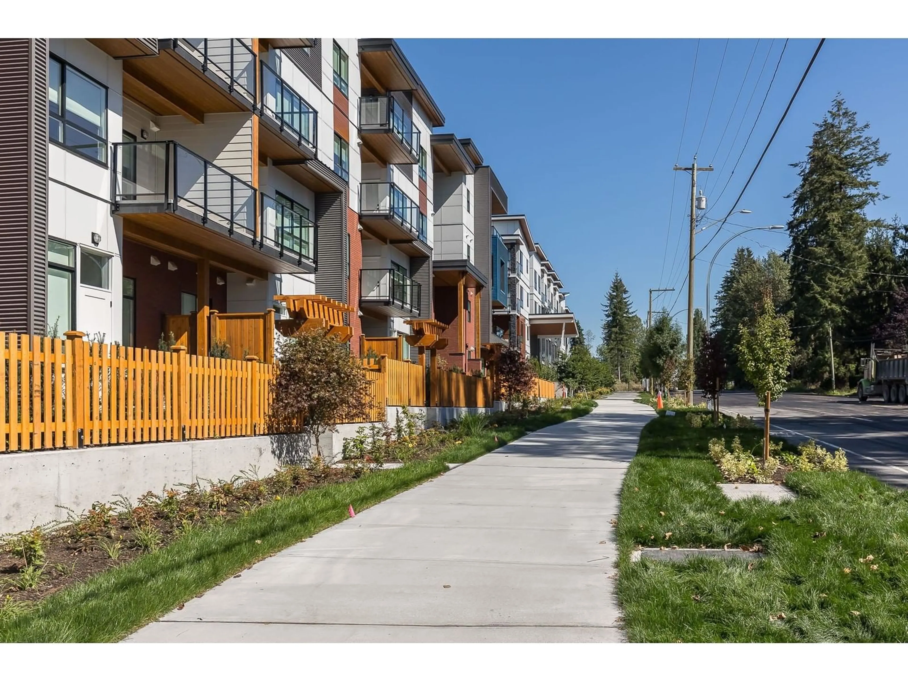 A pic from exterior of the house or condo, the street view for 404 20286 72B AVE AVENUE, Langley British Columbia V2Y3X4