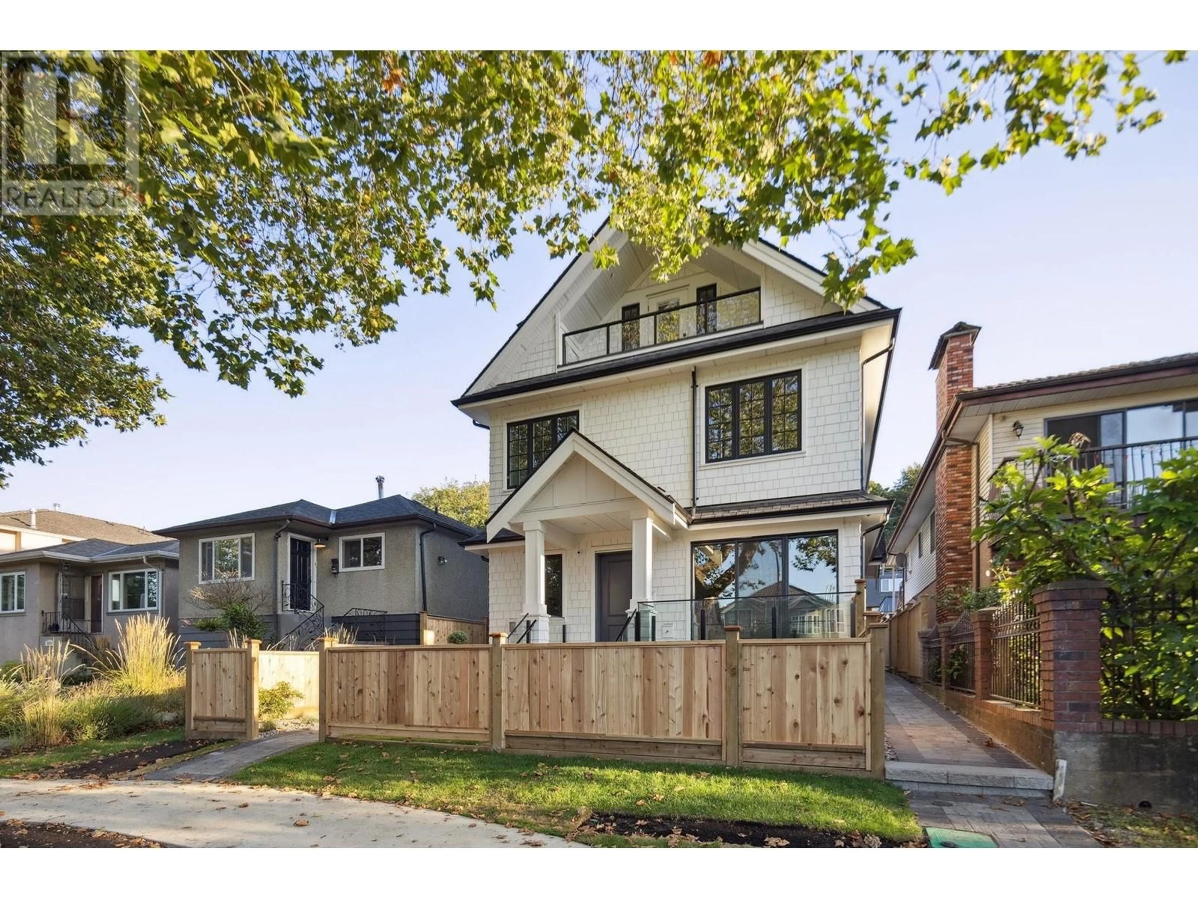 Frontside or backside of a home, the fenced backyard for 2 2640 NAPIER STREET, Vancouver British Columbia V5K2W6