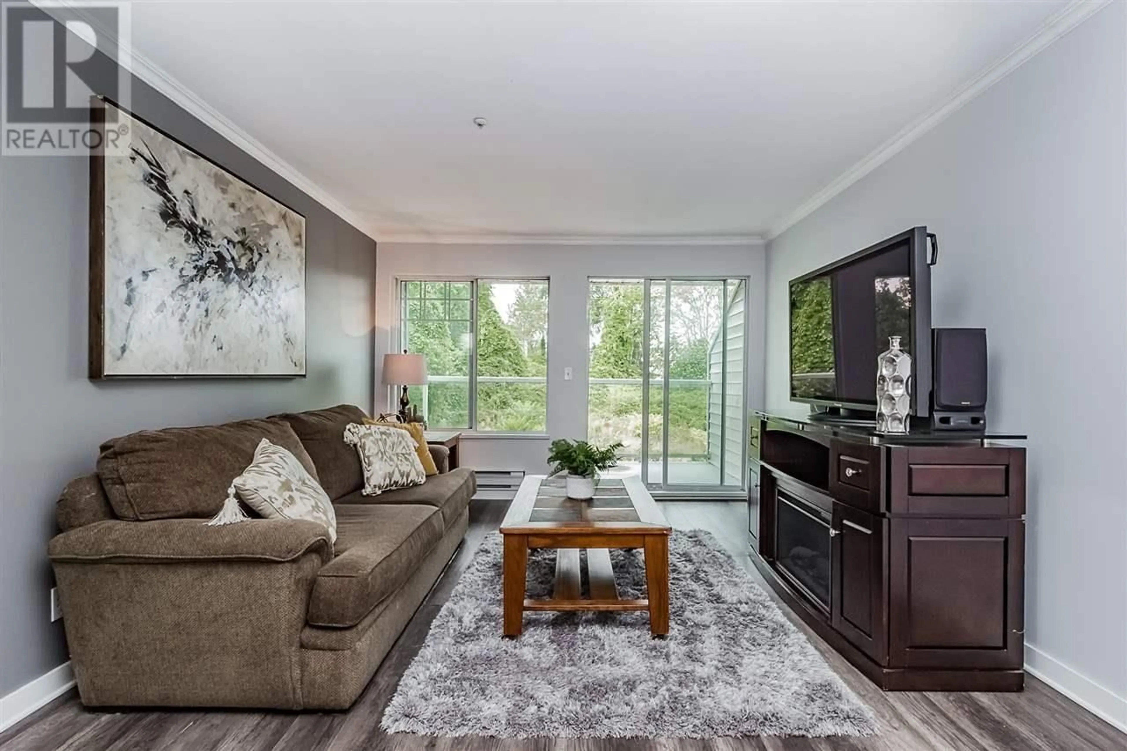 Living room, wood floors for 410 11671 FRASER STREET, Maple Ridge British Columbia V2X6C4