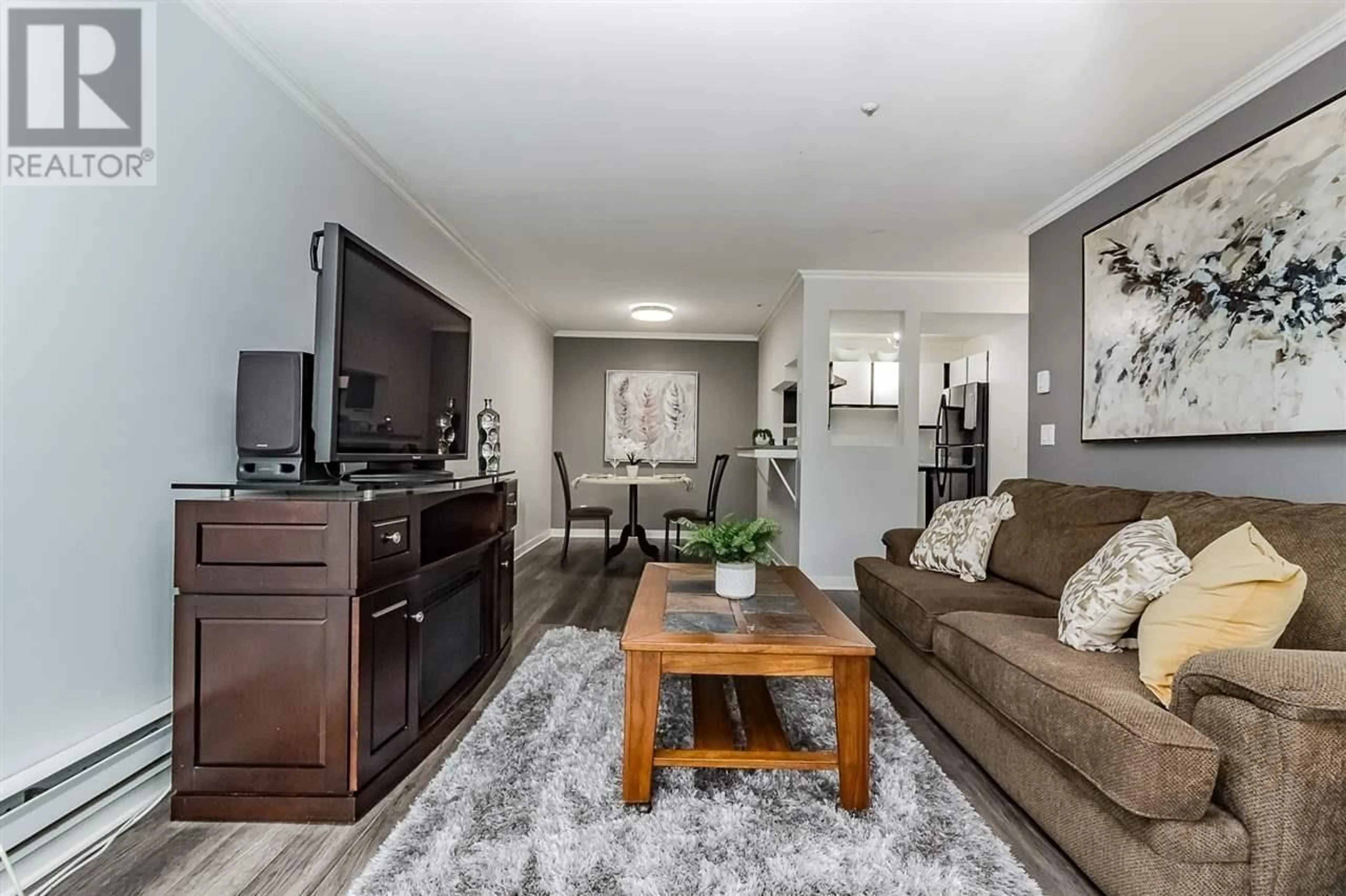 Living room, carpet floors for 410 11671 FRASER STREET, Maple Ridge British Columbia V2X6C4