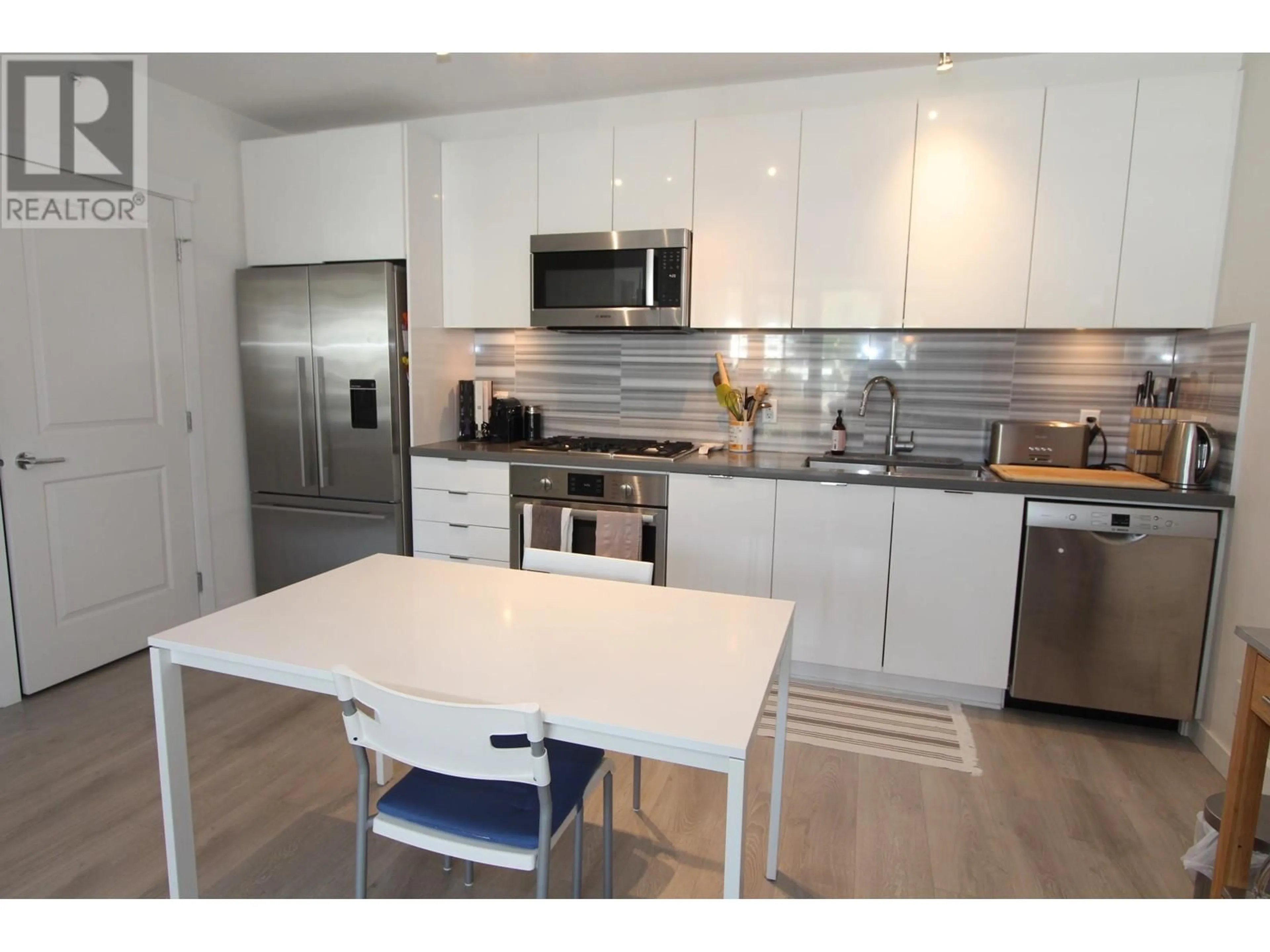 Open concept kitchen for 601 3168 RIVERWALK AVENUE, Vancouver British Columbia V5S0B8