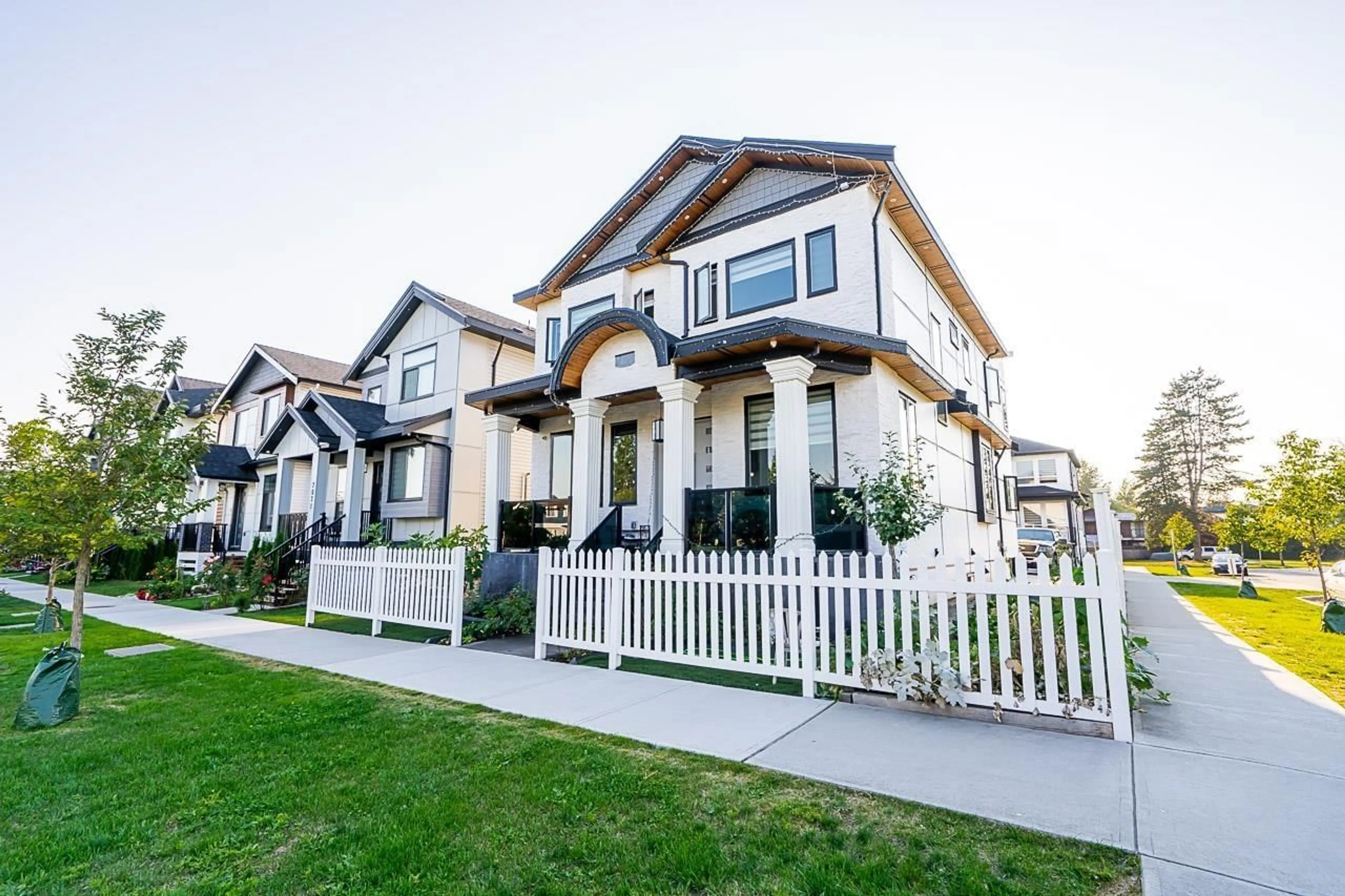 Frontside or backside of a home, the fenced backyard for 7079 194A STREET, Surrey British Columbia V4N1N2