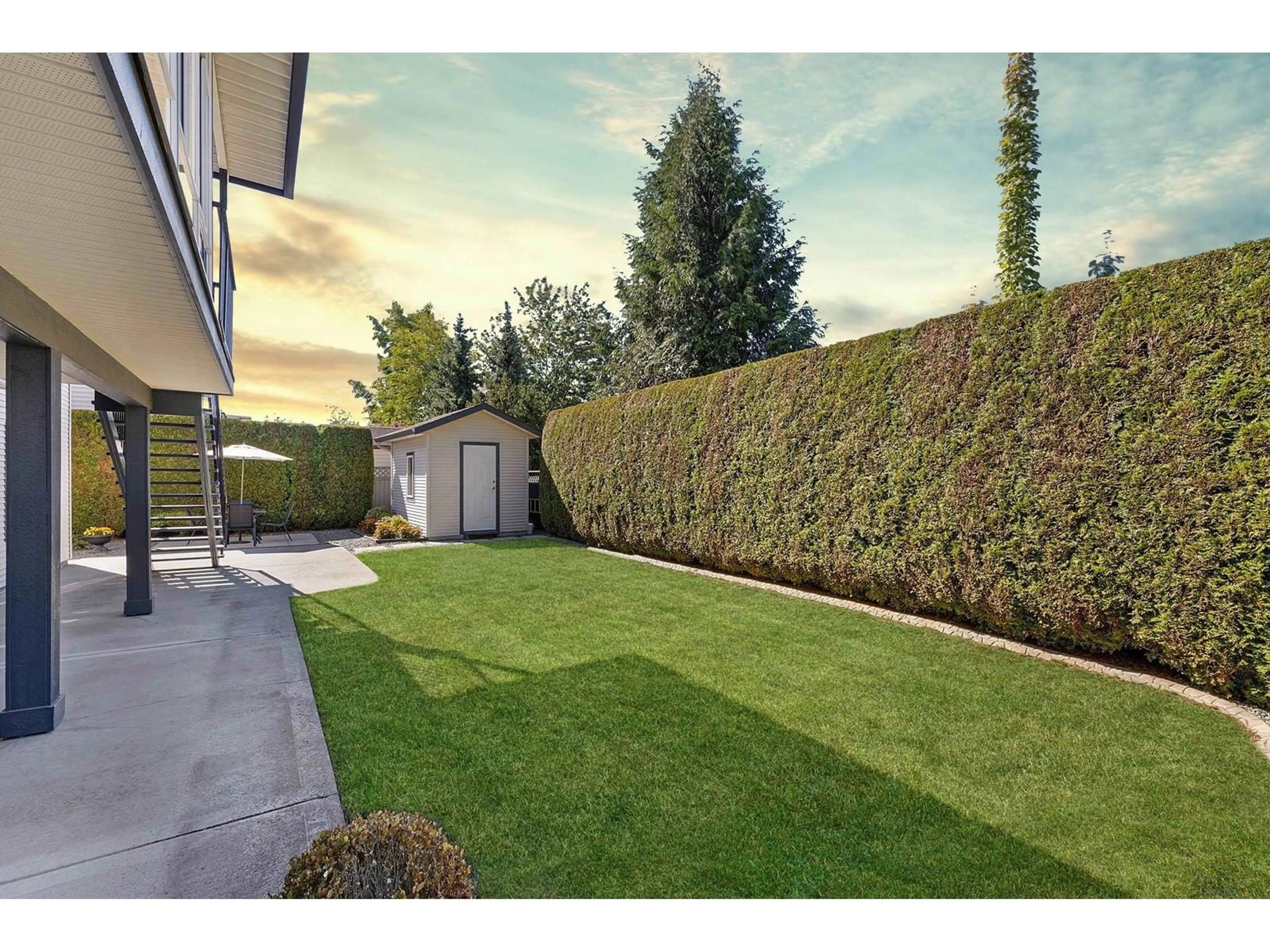 A pic from exterior of the house or condo, the fenced backyard for 2879 BUFFER CRESCENT, Abbotsford British Columbia V4X2S5