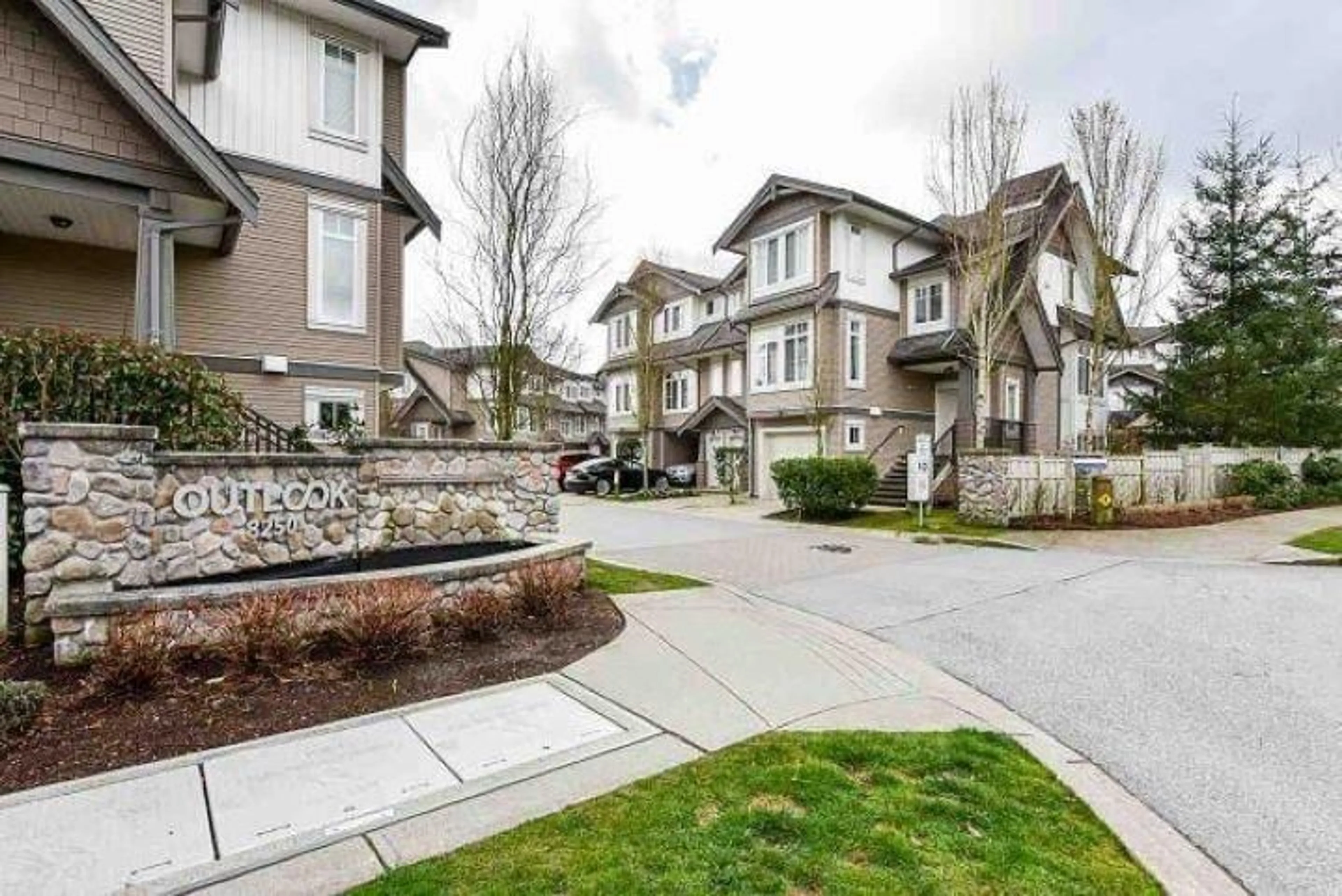 A pic from exterior of the house or condo, the street view for 14 8250 209B STREET, Langley British Columbia V2Y0J7