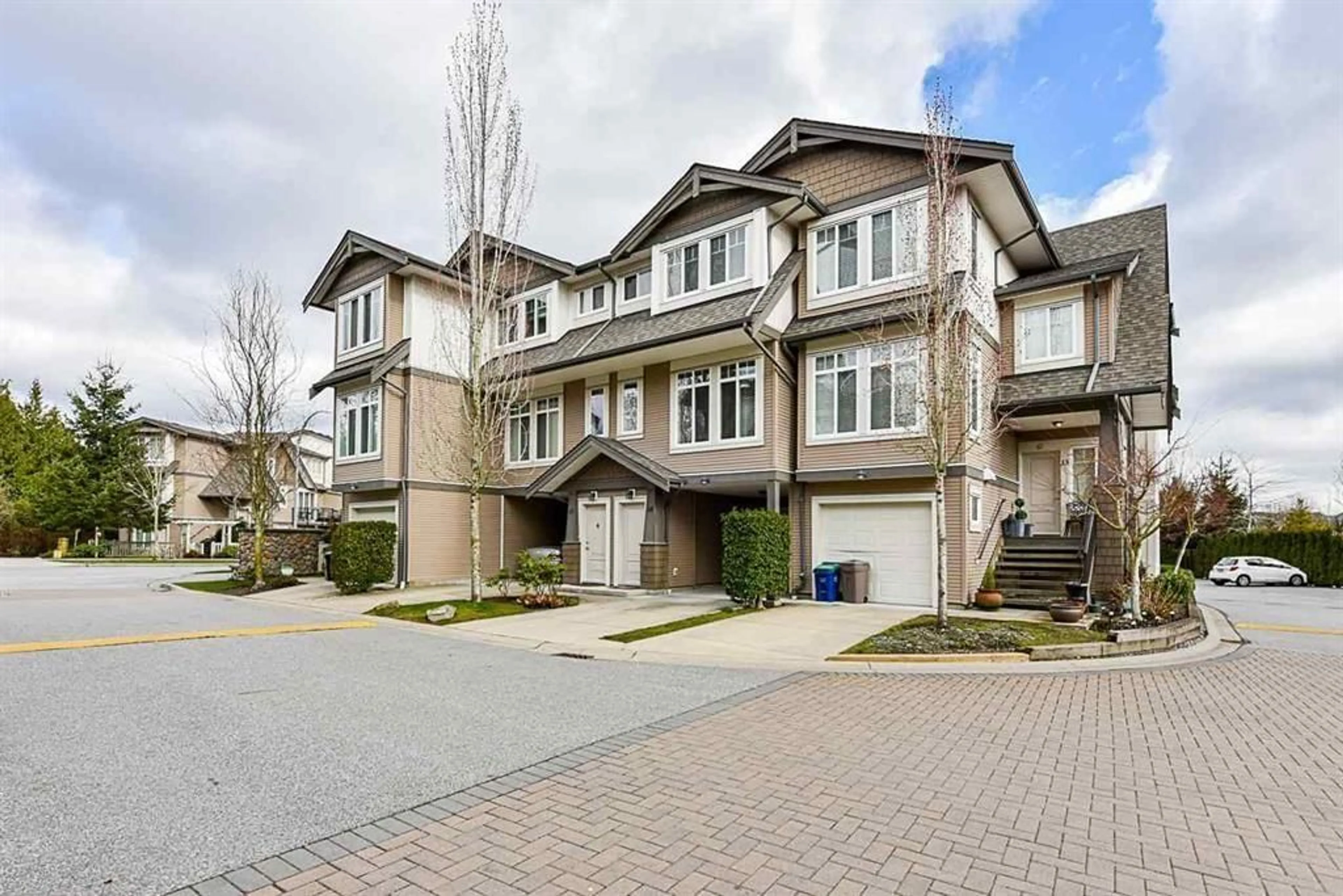 A pic from exterior of the house or condo, the street view for 14 8250 209B STREET, Langley British Columbia V2Y0J7