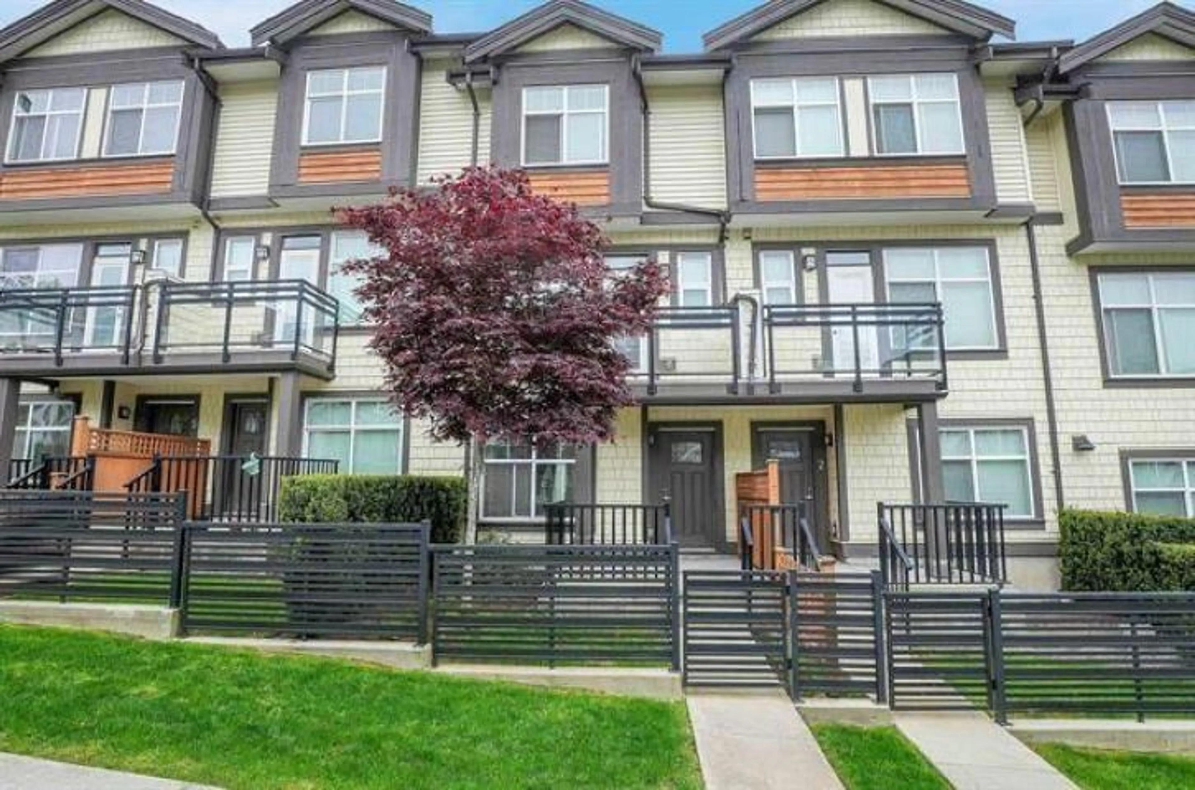 A pic from exterior of the house or condo, the fenced backyard for 4 6055 138 STREET, Surrey British Columbia V3X0J1