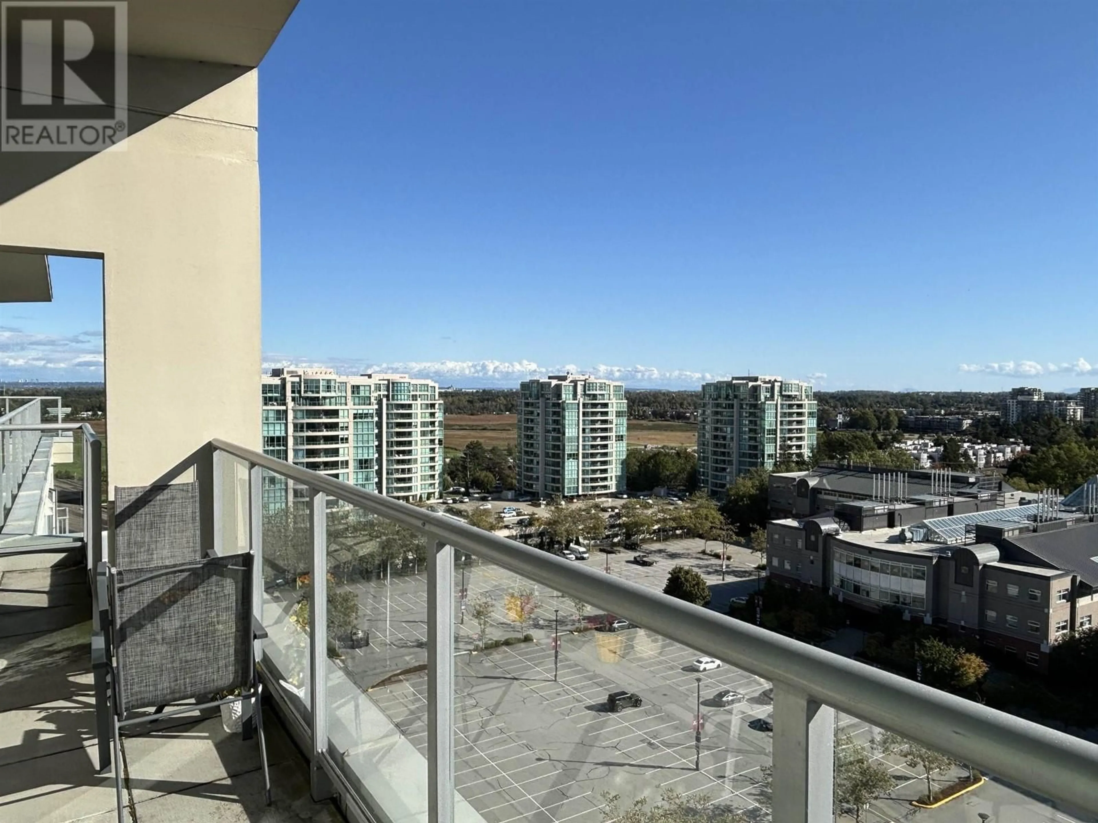 Balcony in the apartment, the view of city buildings for 1905 5088 KWANTLEN STREET, Richmond British Columbia V6X4K5