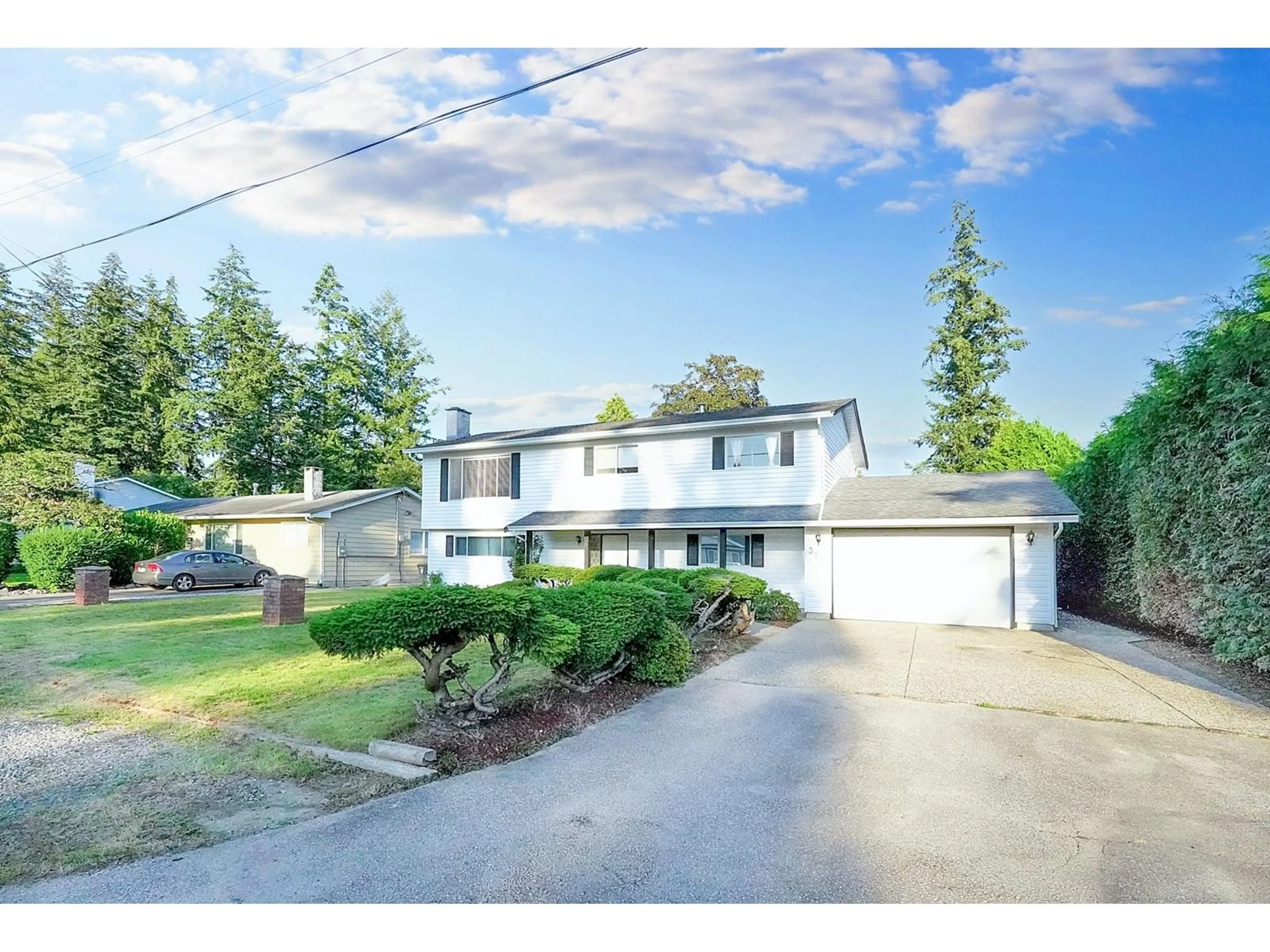 Frontside or backside of a home, the street view for 3722 197A STREET, Langley British Columbia V3A1B7