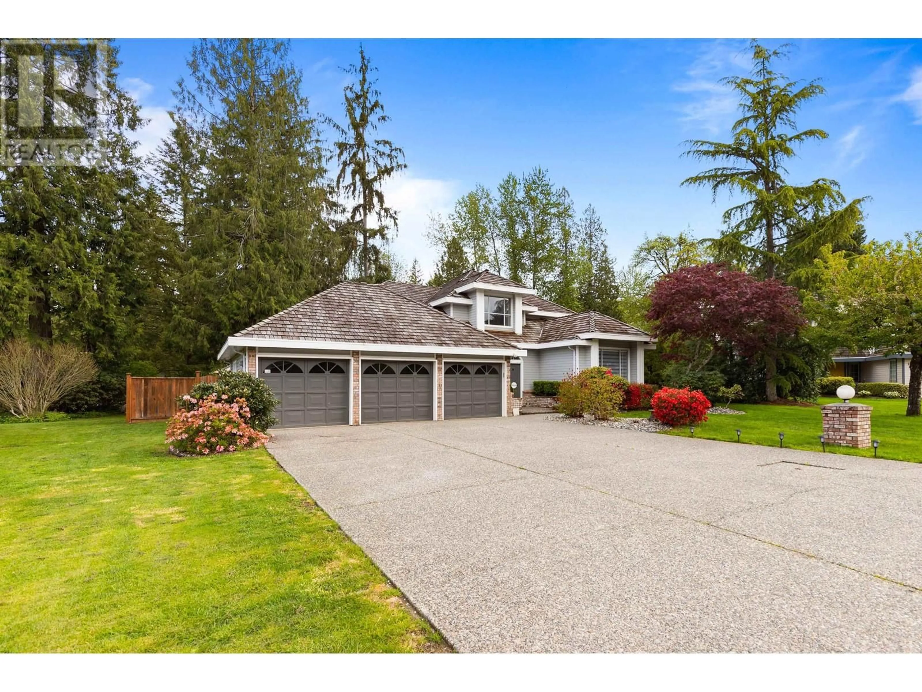 Frontside or backside of a home, the fenced backyard for 14 23100 129 AVENUE, Maple Ridge British Columbia V2X0M5