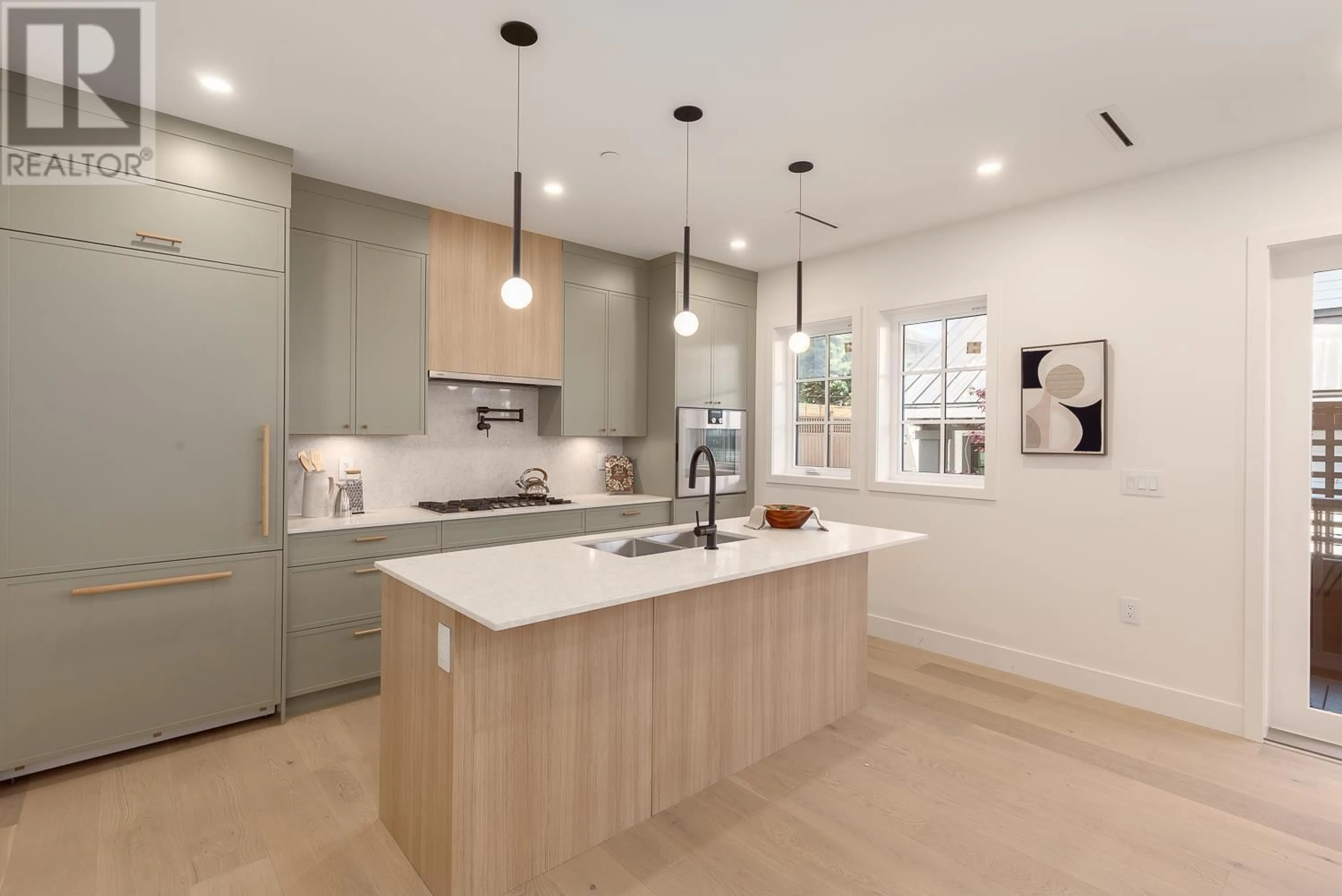 Contemporary kitchen, wood floors for 231 W 15TH AVENUE, Vancouver British Columbia V5Y1Y1