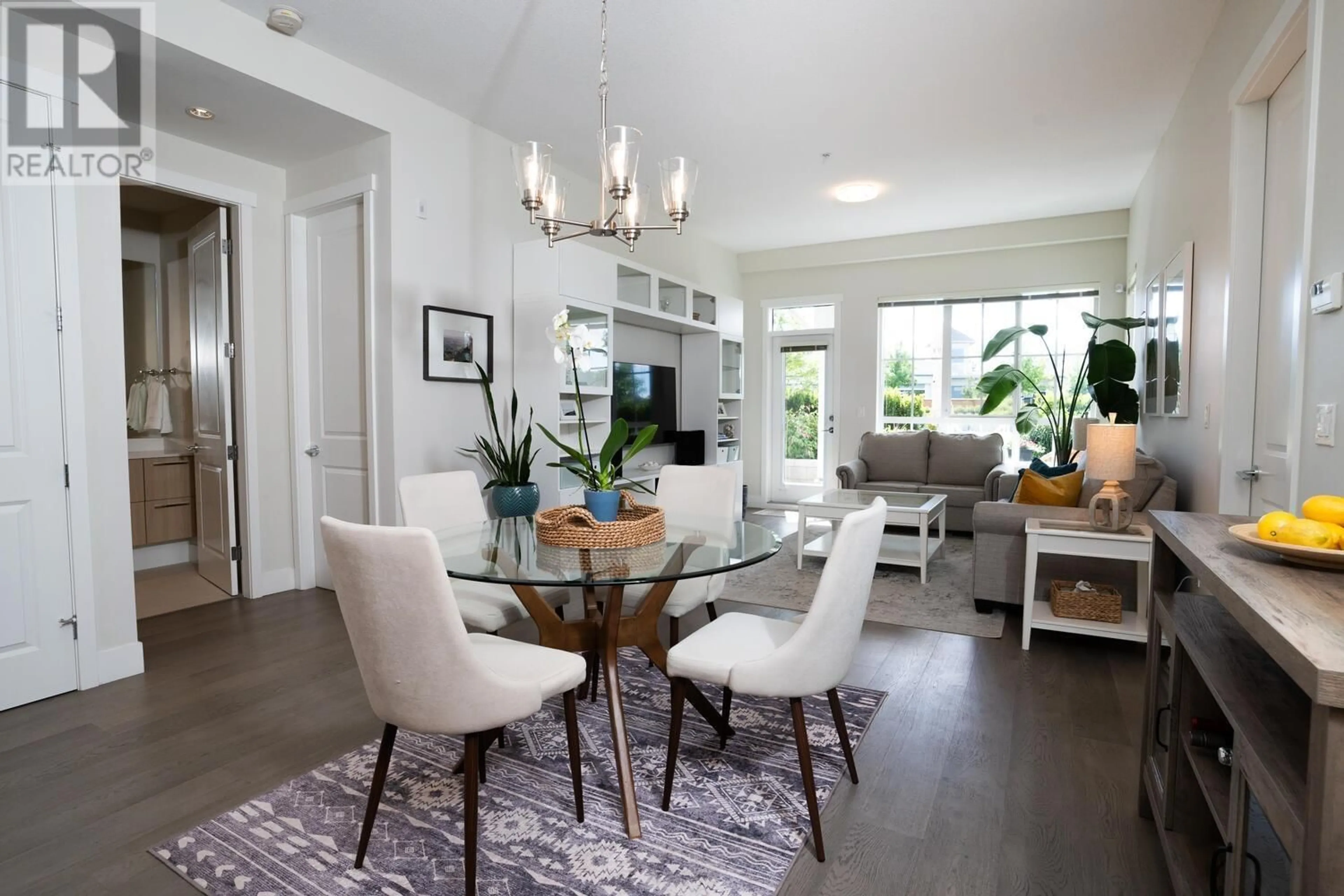 Dining room, wood floors, cottage for 105 5535 ADMIRAL WAY, Delta British Columbia V4K0E3