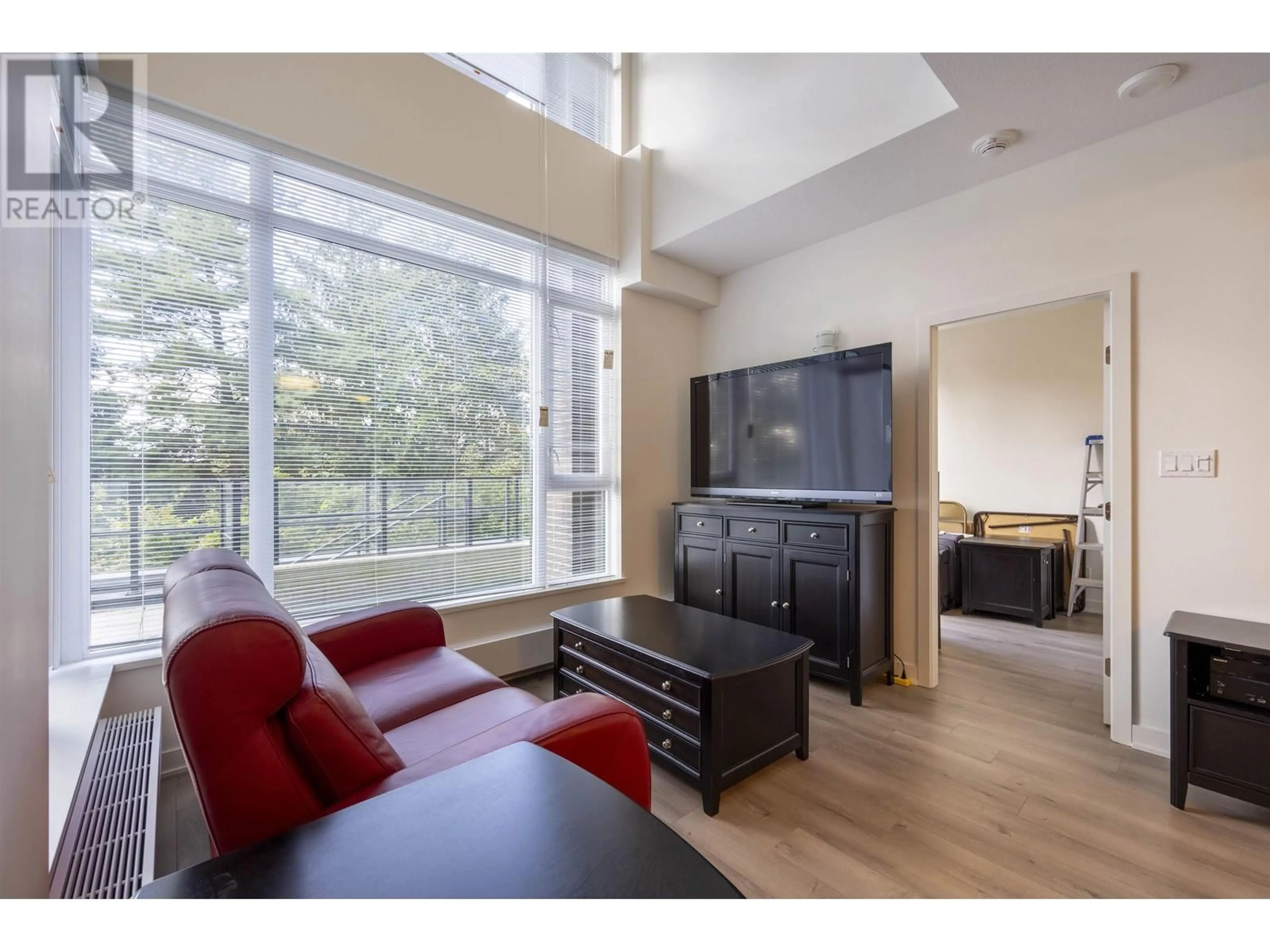 Living room, wood floors for 112 8850 UNIVERSITY CRESCENT, Burnaby British Columbia V5A0C8